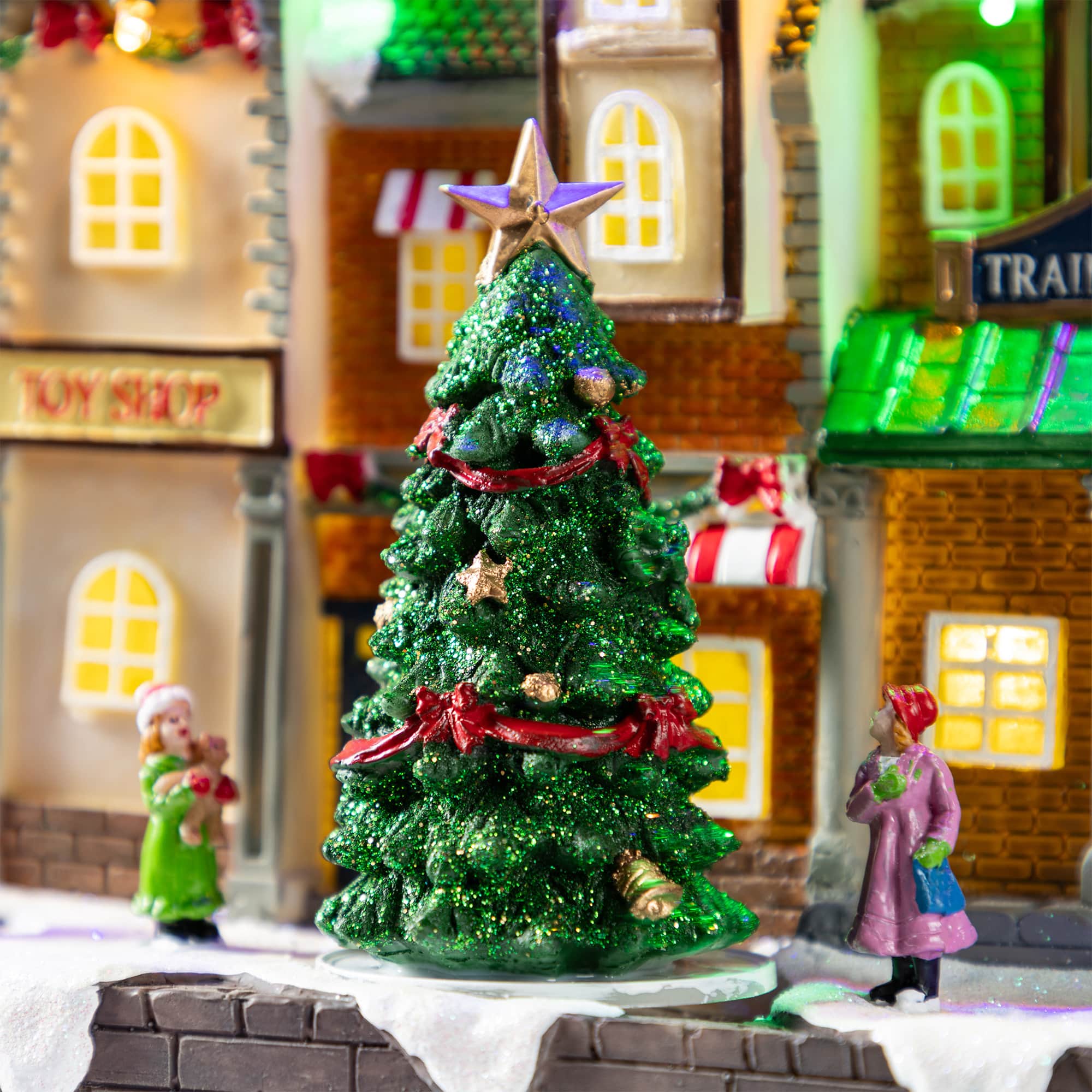 Glitzhome&#xAE; 13.75&#x22; Lighted Christmas Train station Resin Village with Movement and Music
