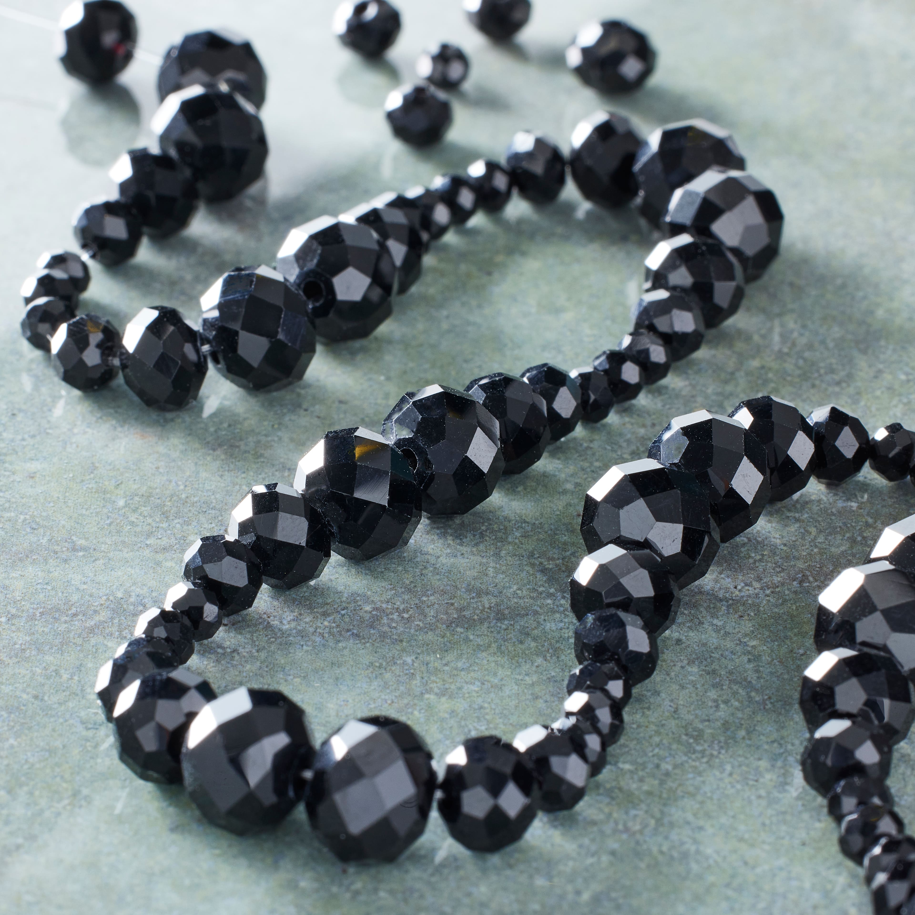 12 Packs: 4 ct. (48 total) Black Faceted Glass Round Beads by Bead Landing&#x2122;