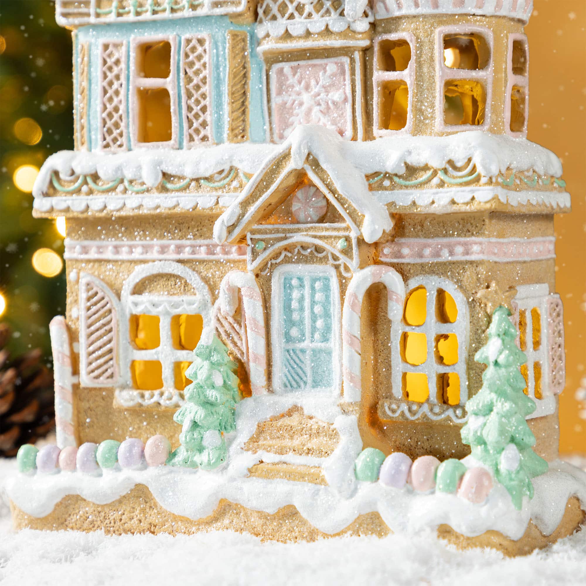 Glitzhome® 11.75" Christmas Macaron Resin Village Table Decor