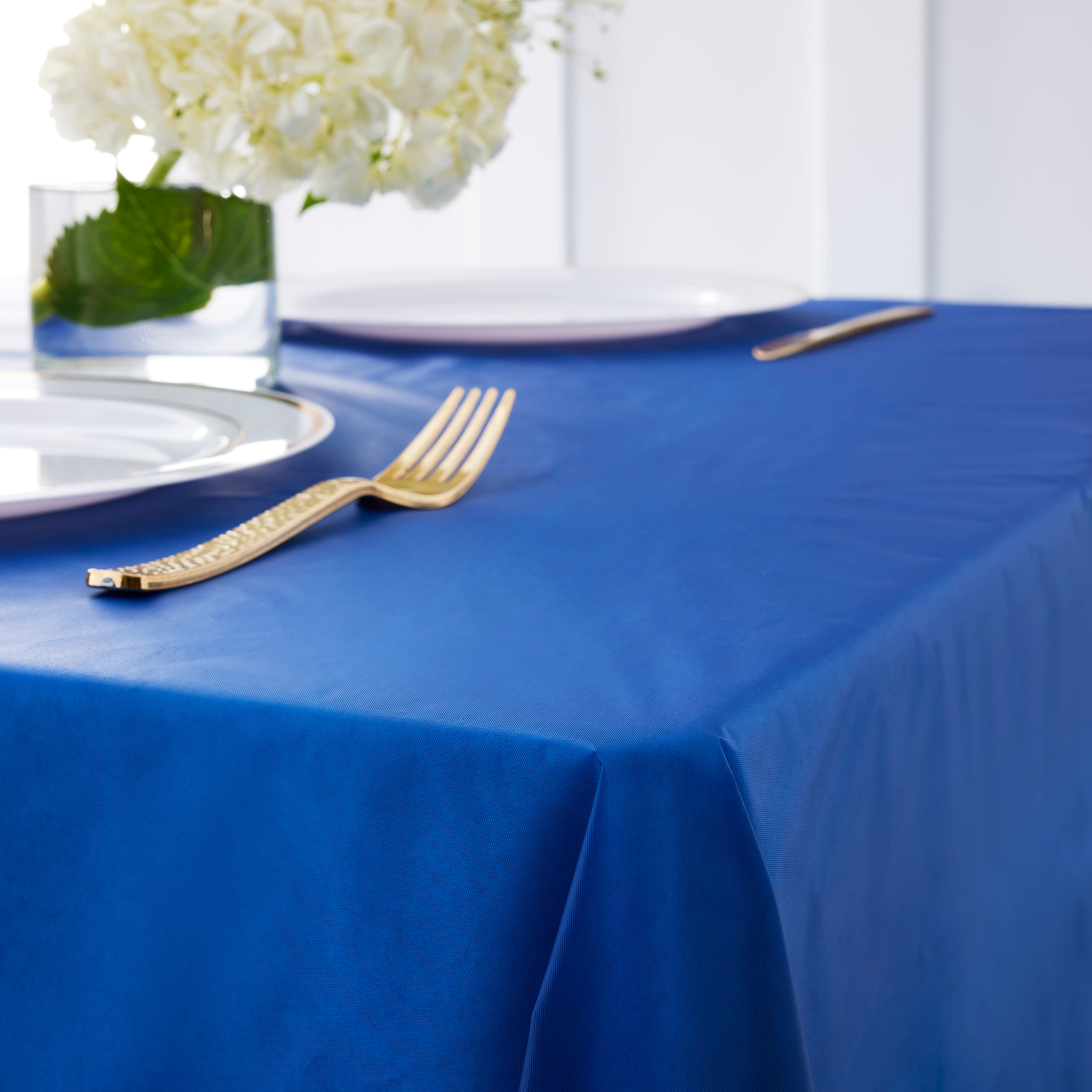 12 Pack: 100ft. Blue Plastic Table Cover Roll by Celebrate It&#x2122;