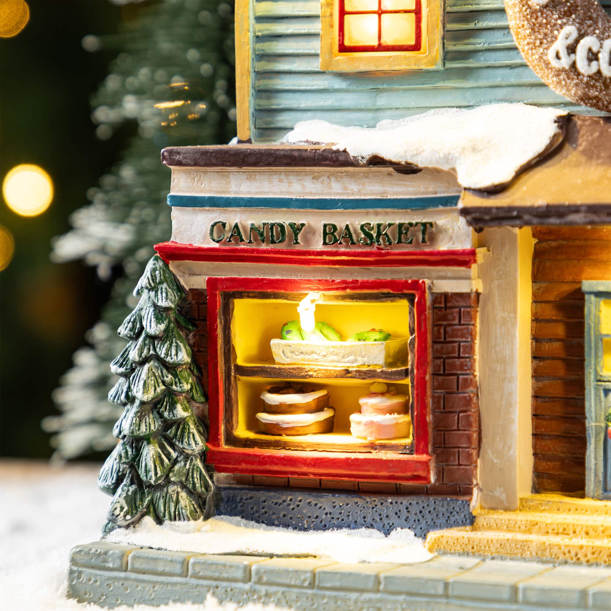 Glitzhome&#xAE; 10.25&#x22; Lighted Christmas Donuts &#x26; Coffee Shop Resin Village with Movement and Music