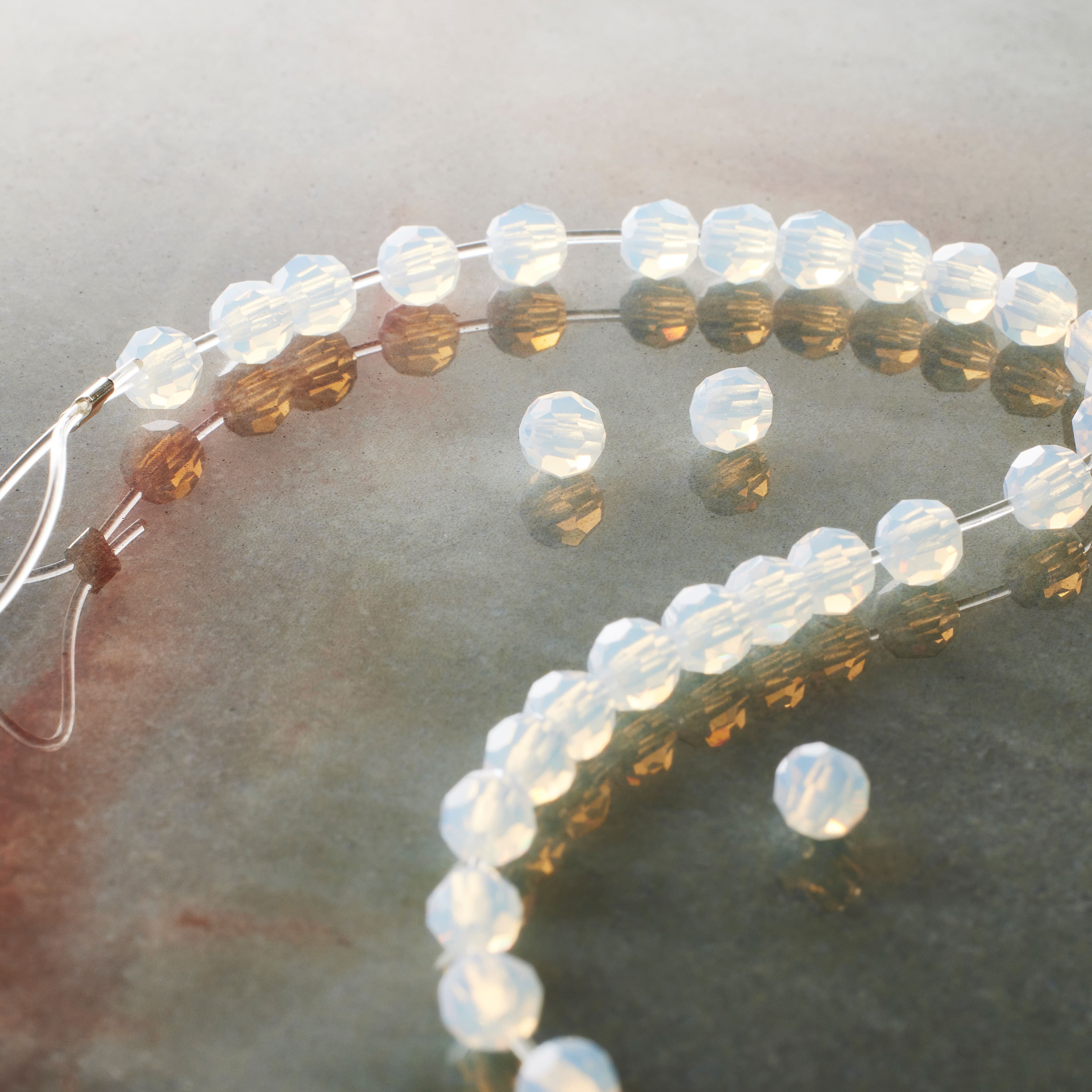 12 Packs: 31 ct. (372 total) Preciosa Glass Crystal Round Beads, 4mm by Bead Landing™