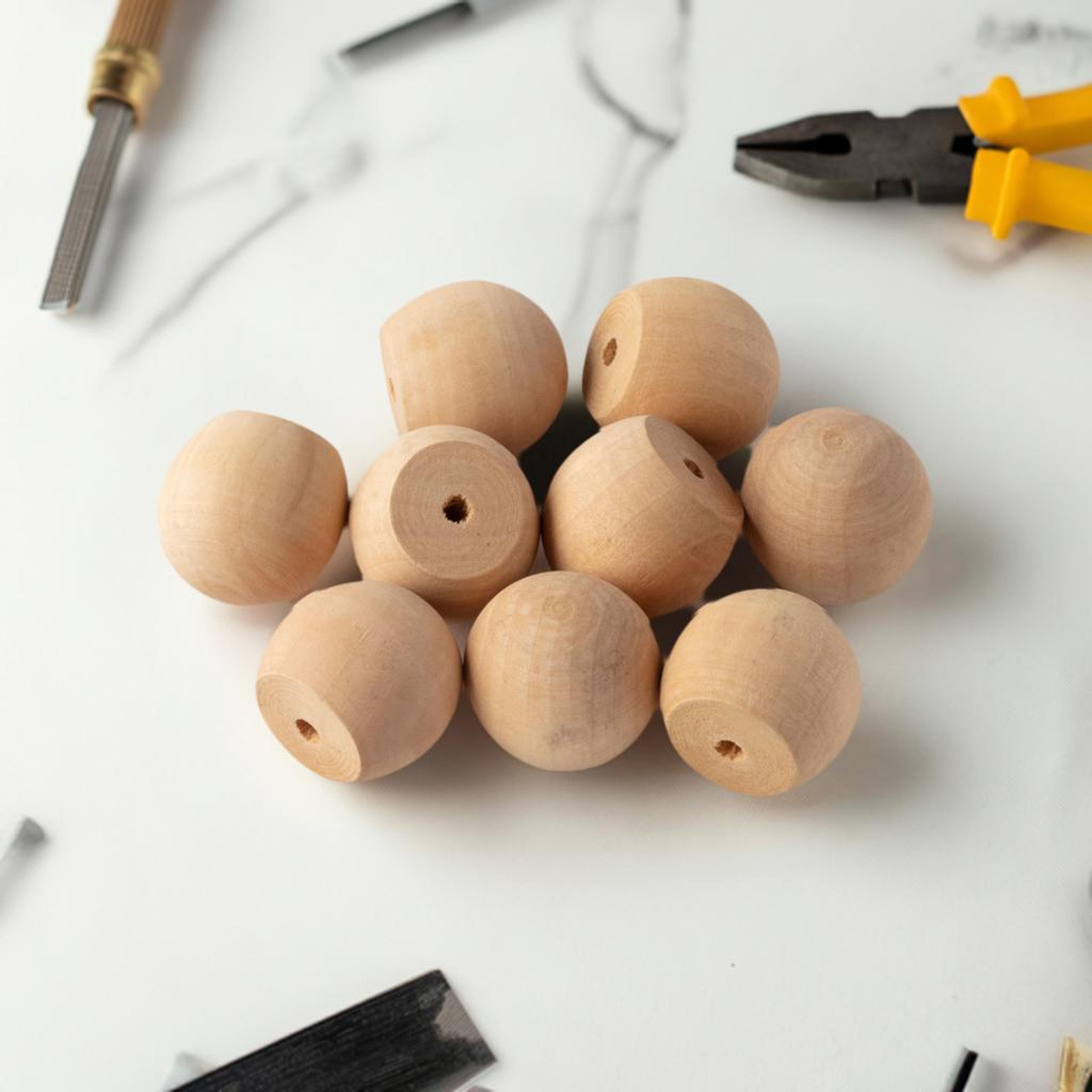 1.25&#x22; Wood Doll Heads, 9ct. by Make Market&#xAE;