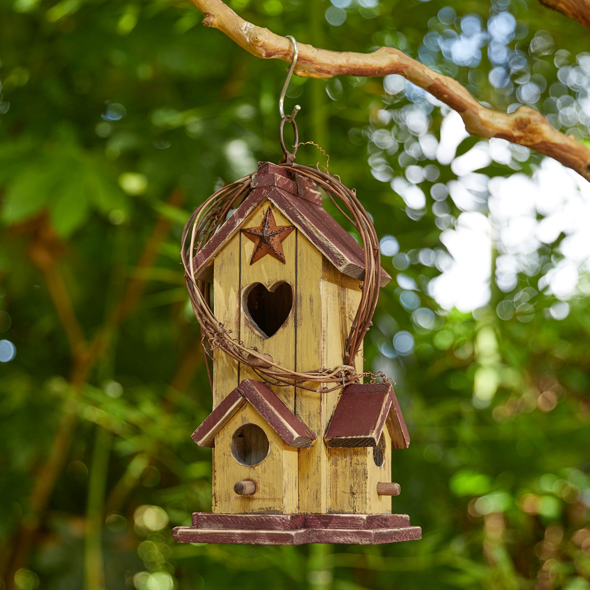 Glitzhome&#xAE; 11.5&#x22; Yellow Washed with Rattan Distressed Wood Cottage Birdhouse