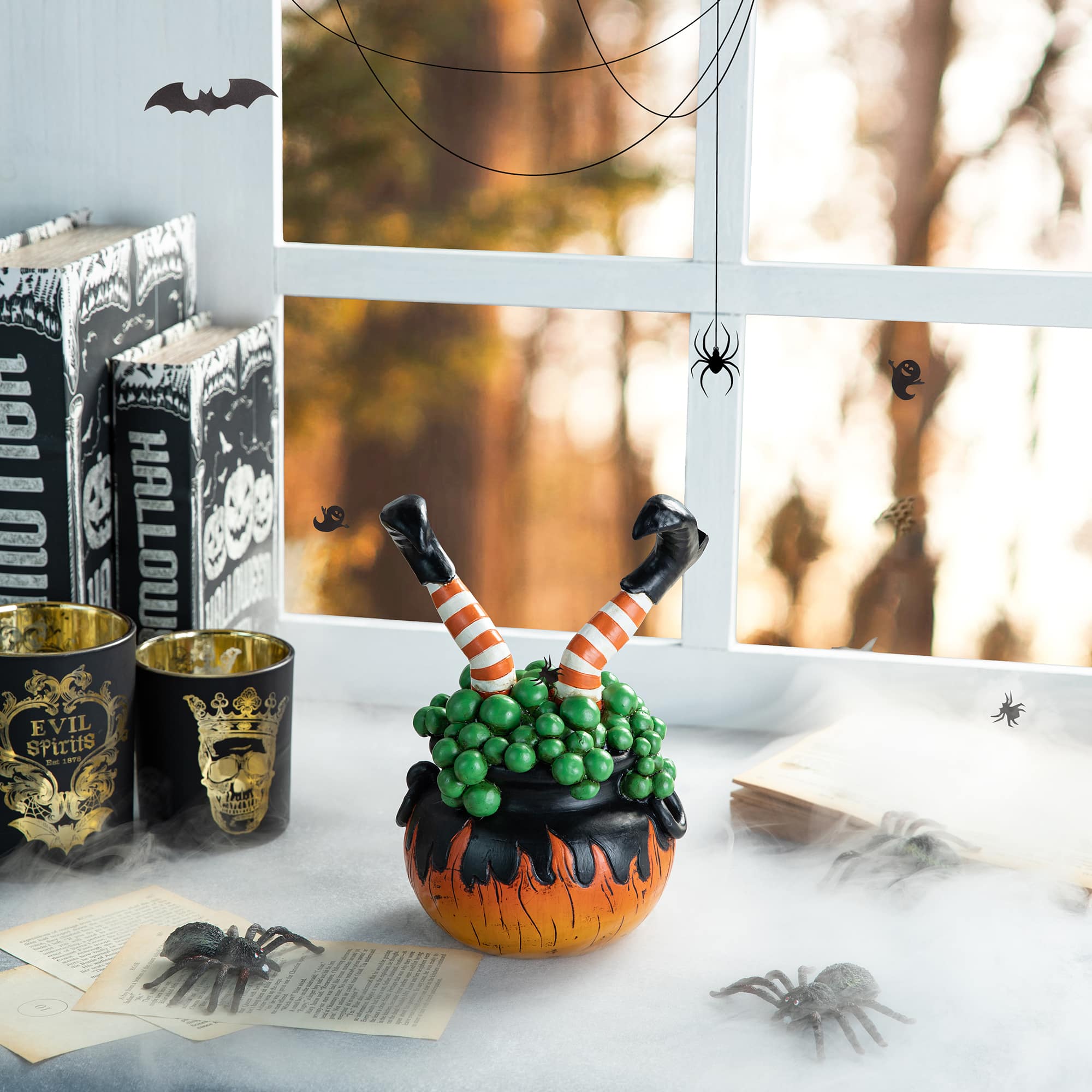 Glitzhome&#xAE; 8.75&#x22; Halloween Witch in Cauldron Table D&#xE9;cor