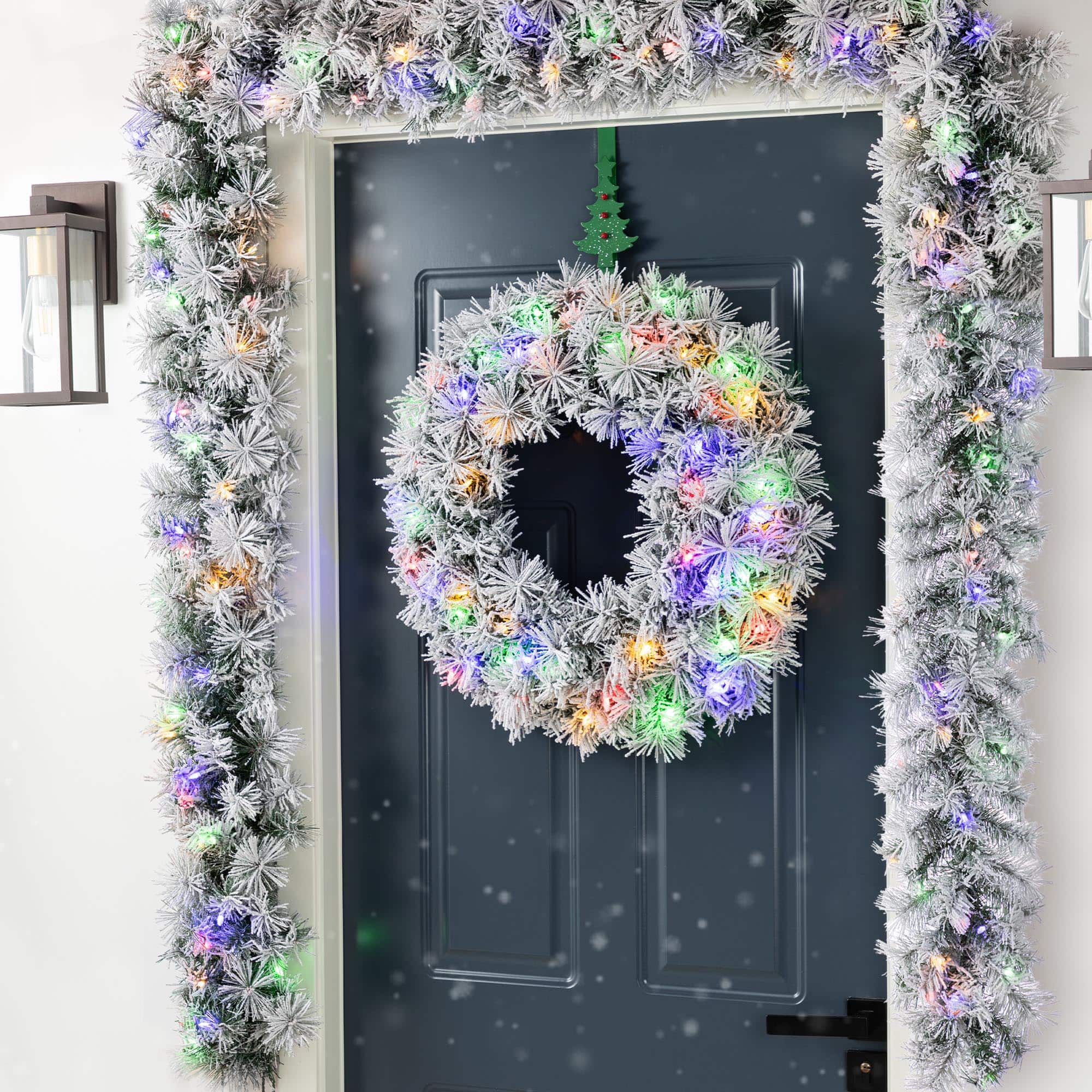 Glitzhome&#xAE; 9ft Pre-Lit Snow Flocked Greenery Pine Christmas Garland with Timer