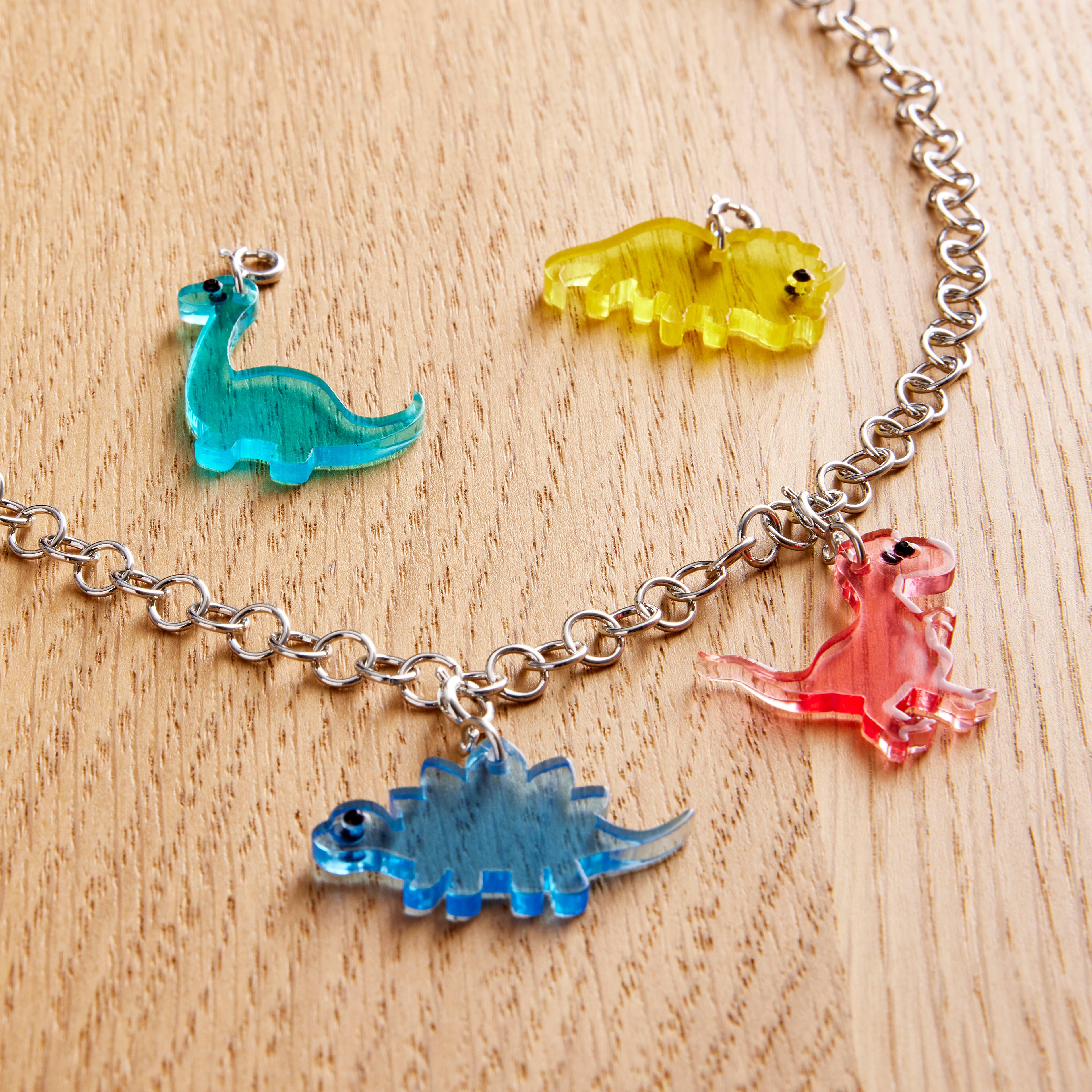 12 Packs: 4 ct. (48 total) Dinosaur Charms by Creatology&#x2122;