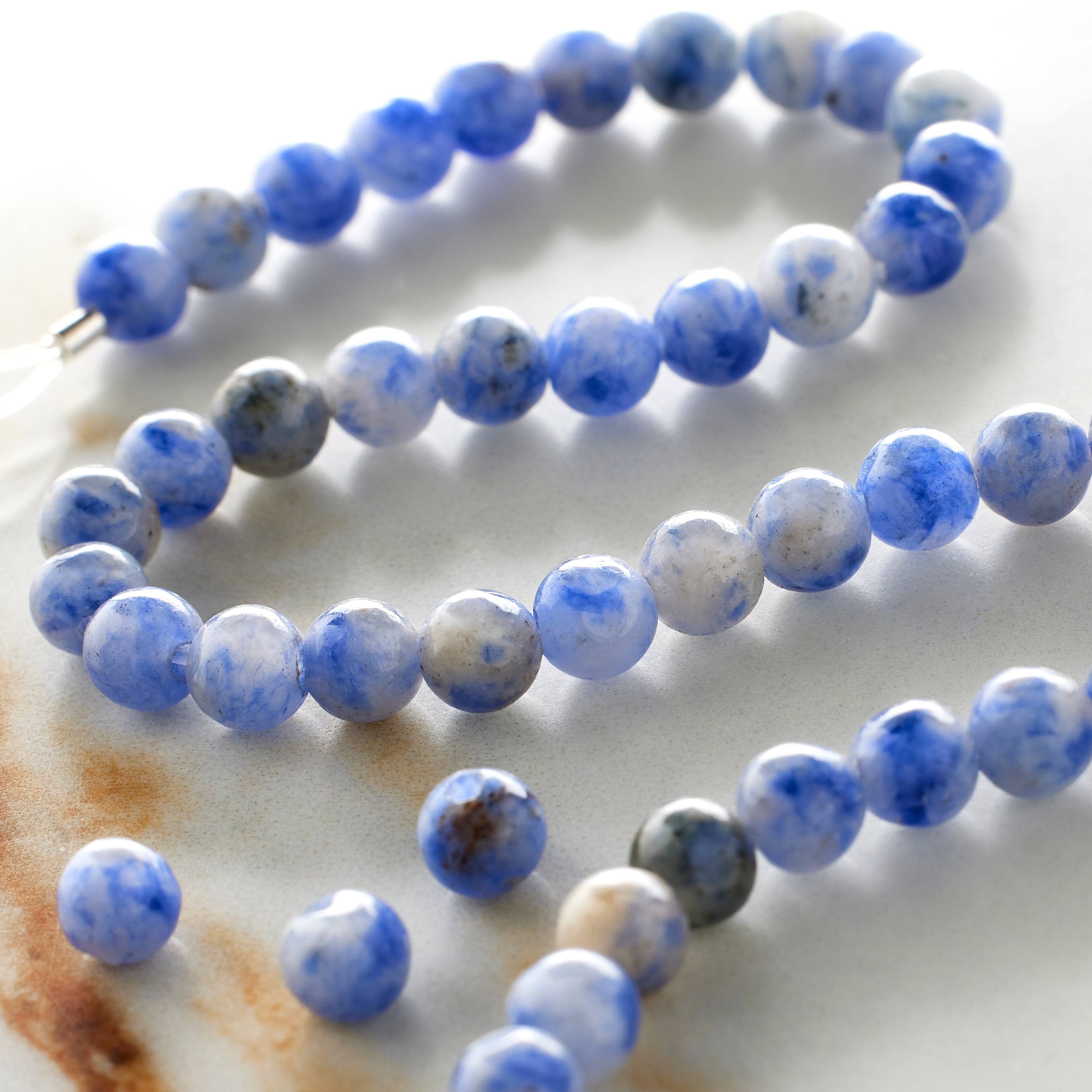12 Packs: 2 ct. (24 total) Blue Spotted Sodalite Stone Round Beads, 4mm by Bead Landing®