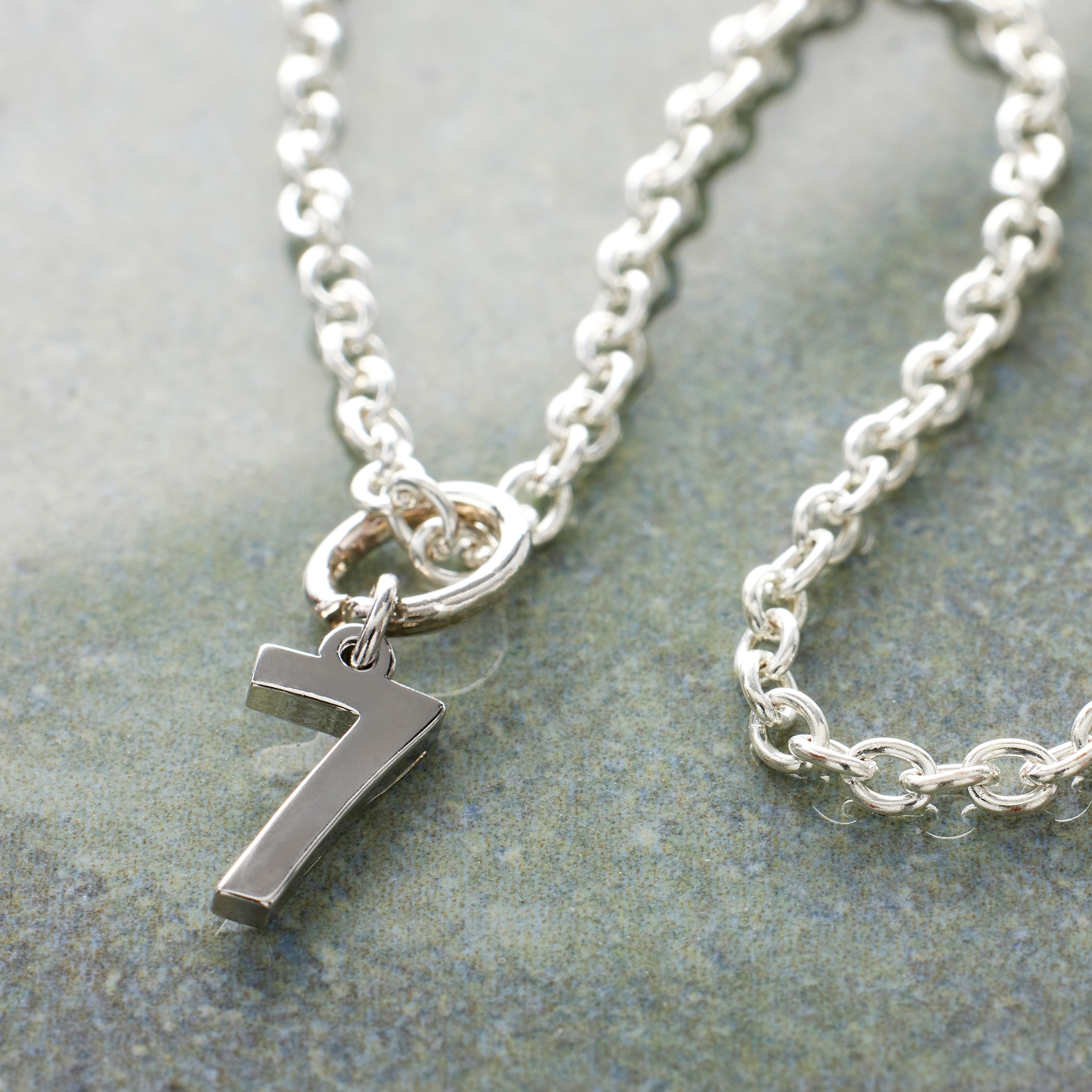 12 Pack: Sterling Silver Number Charm by Bead Landing™