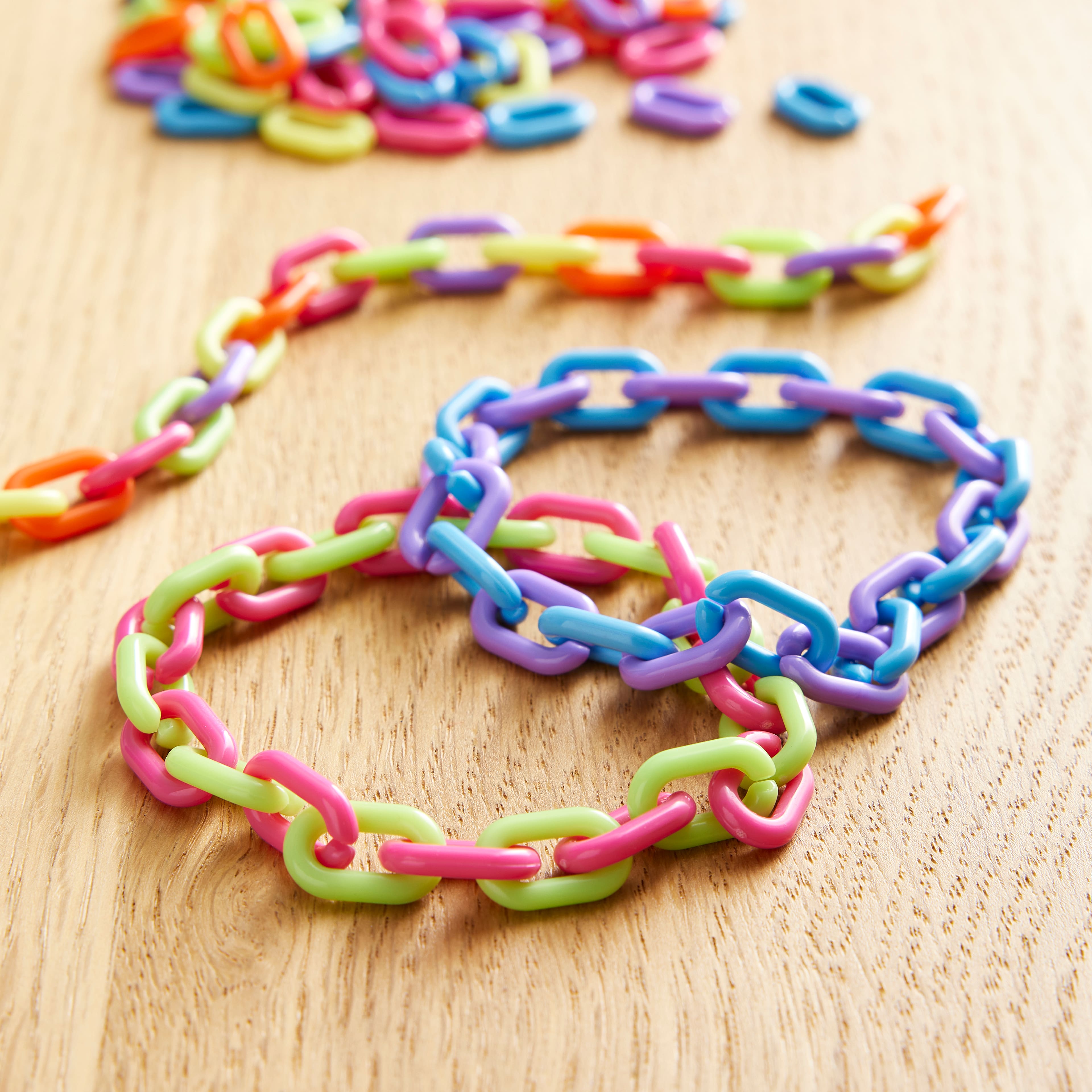 12 Packs: 400 ct. (4,800 total) Rainbow Plastic Chain Links by Creatology™