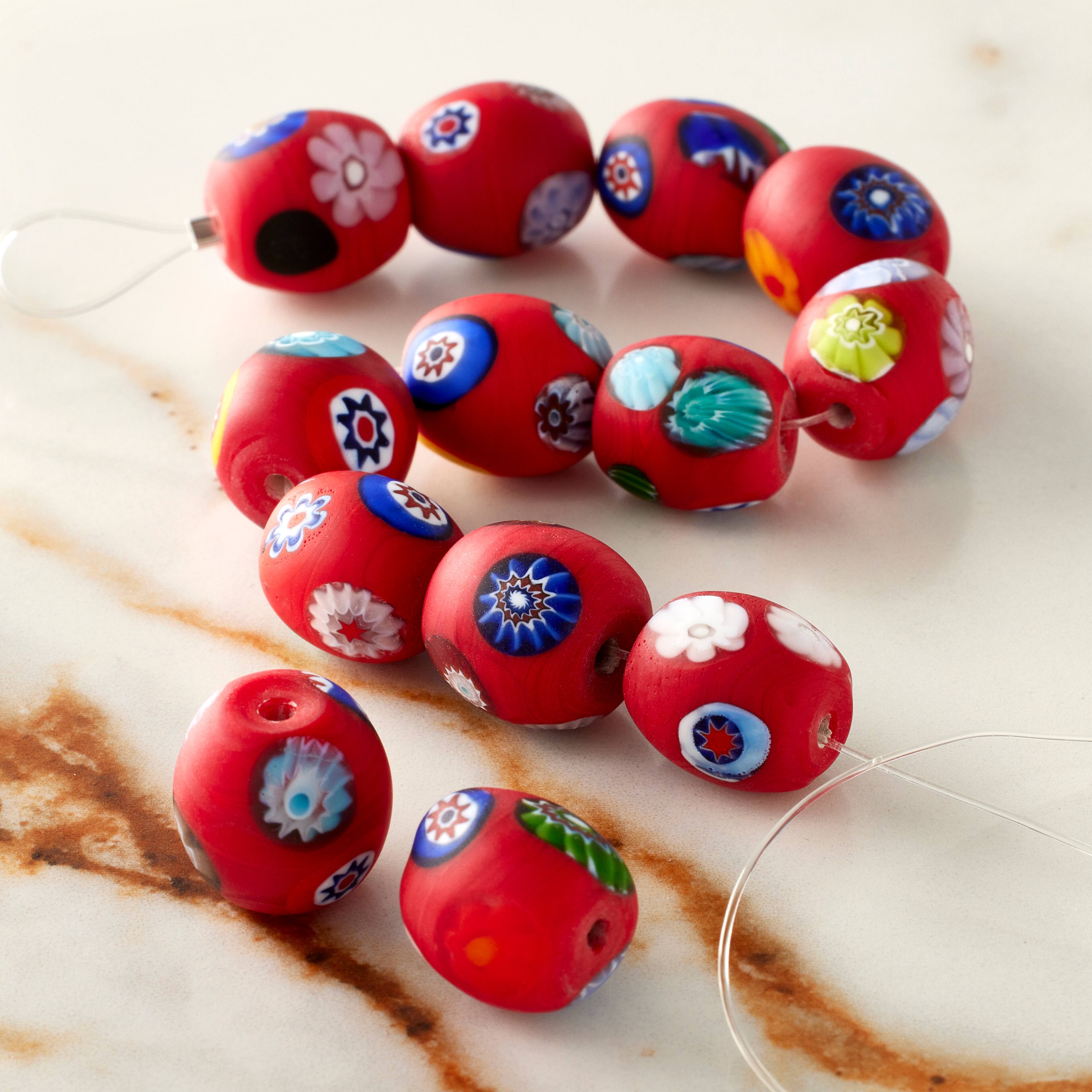 12 Packs: 13 ct. (156 total) Red Millefiori Oval Beads by Bead Landing®
