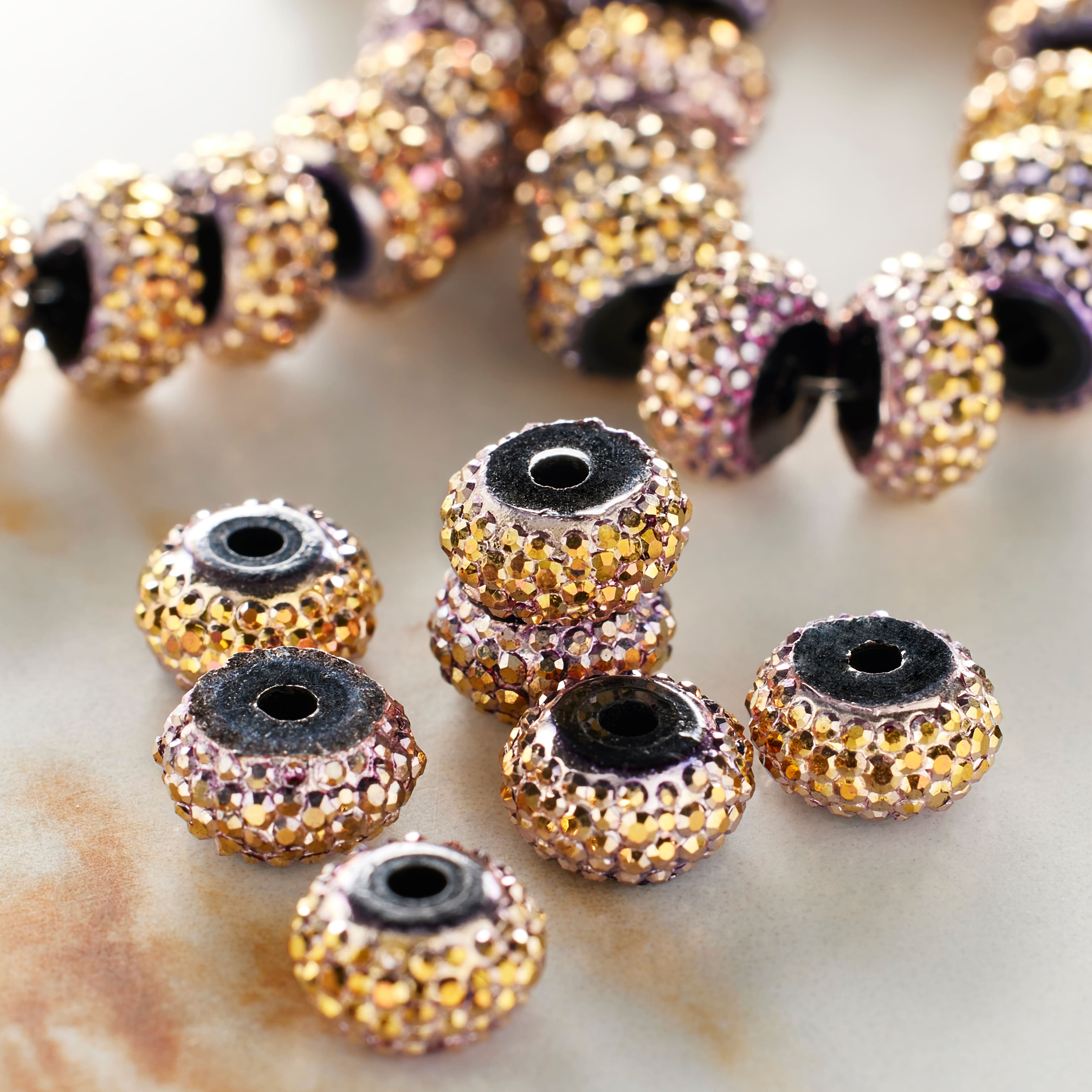 12 Packs: 38 ct. (456 total) Amber Studded Metal &#x26; Resin Rondelle Beads, 8mm by Bead Landing&#x2122;