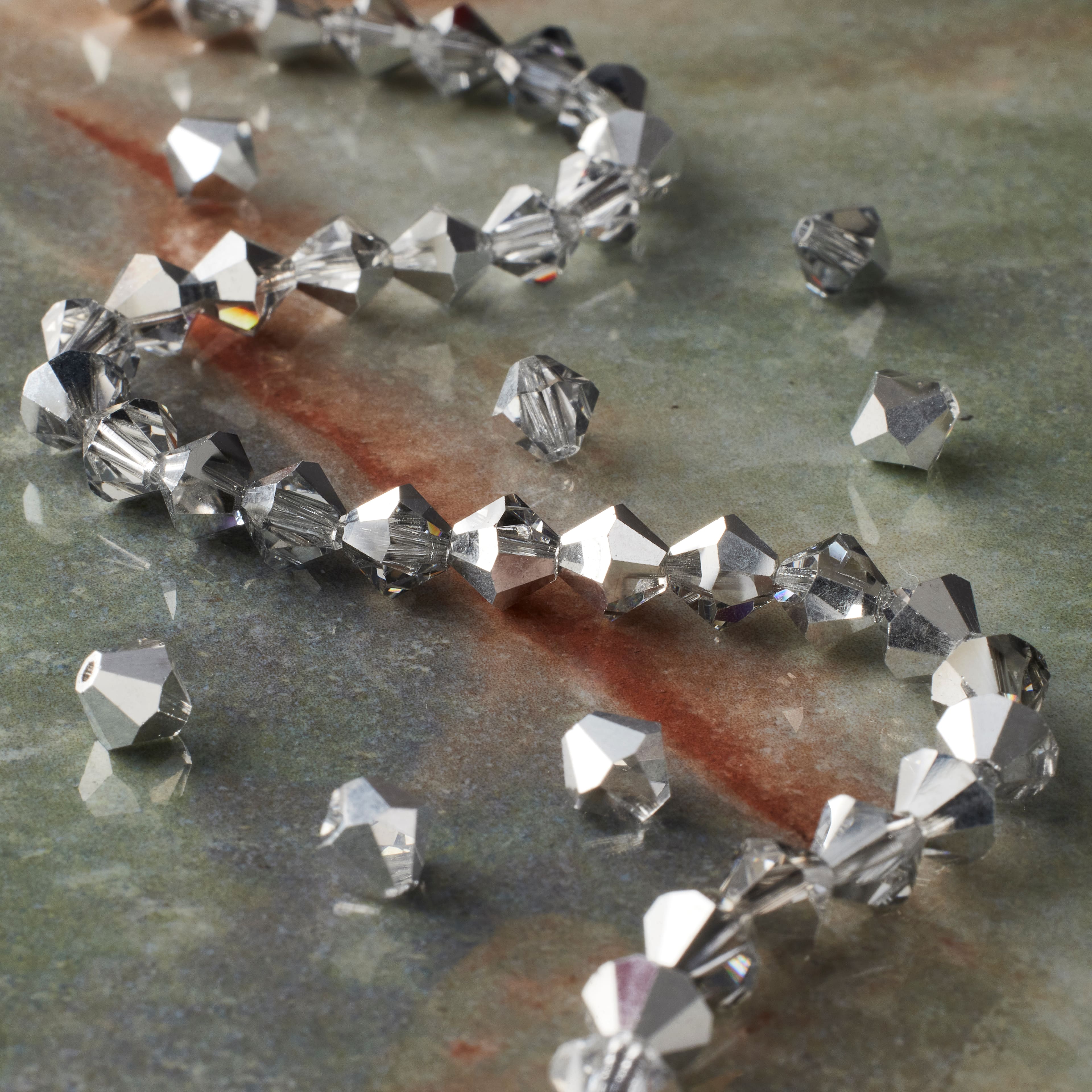 12 Pack: Preciosa Glass Crystal Bicone Beads, 6mm by Bead Landing™