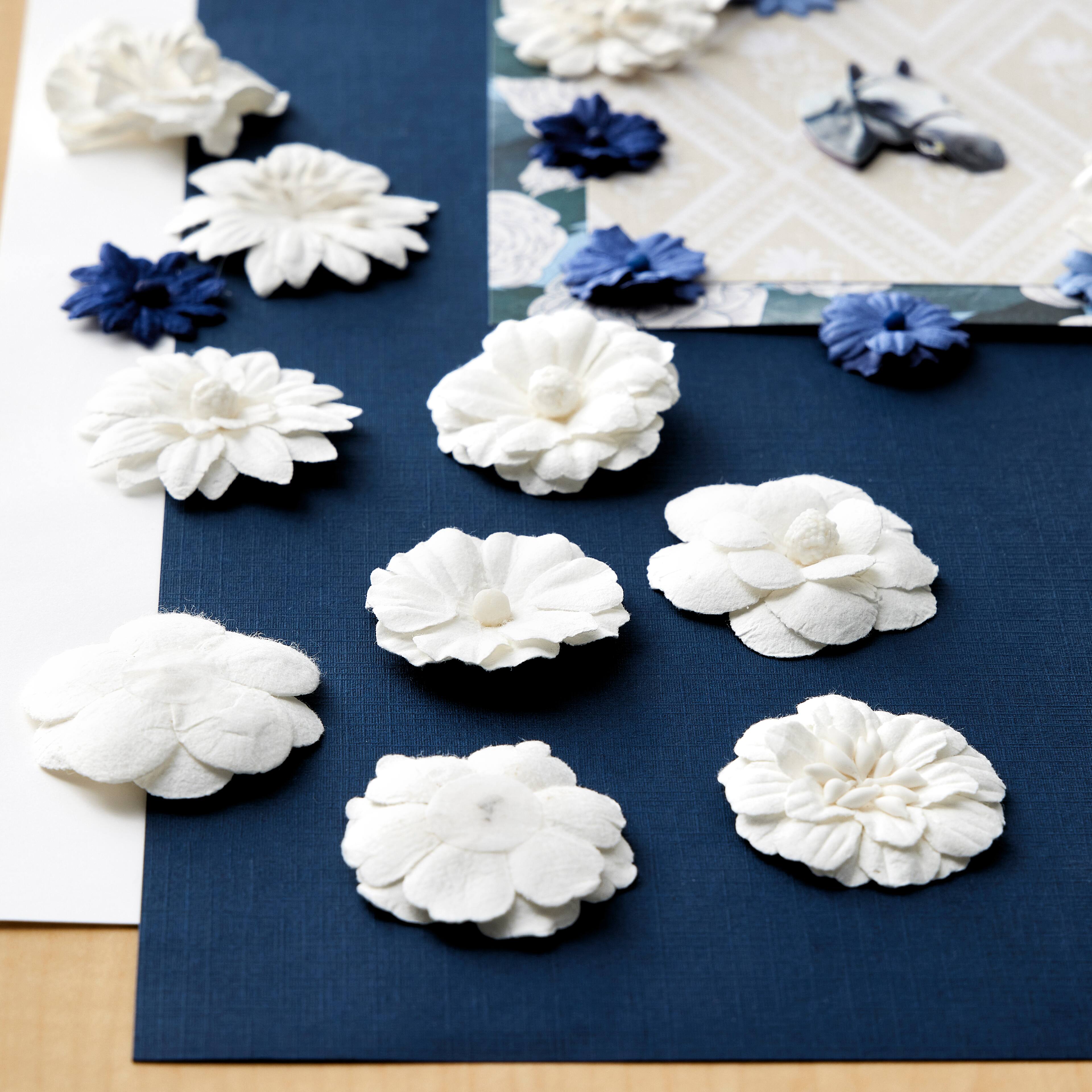 12 Packs: 12 ct. (144 total) White Paper Flower Embellishments by Recollections™
