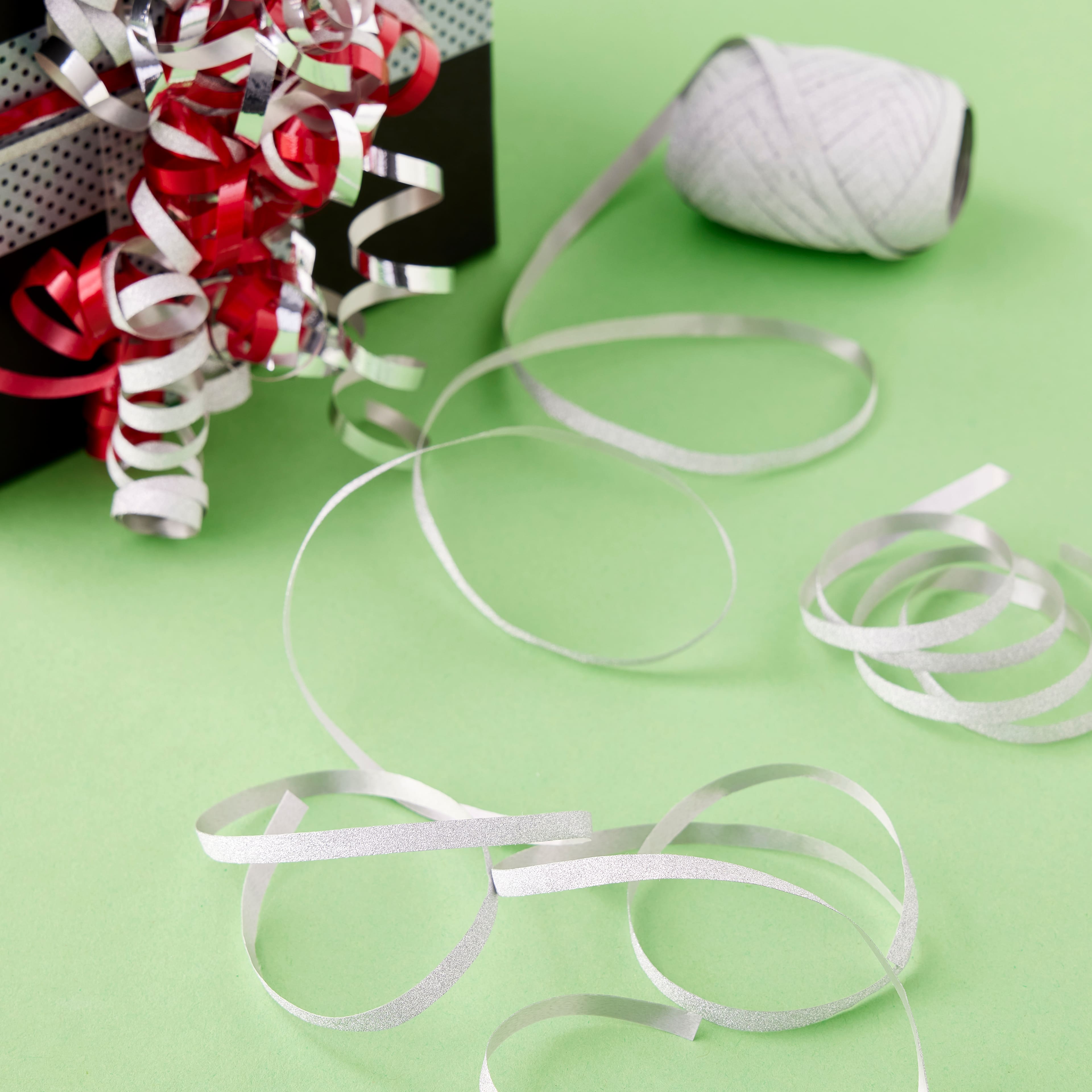 18 Pack: 66ft. Silver Ribbon Keg by Celebrate It™