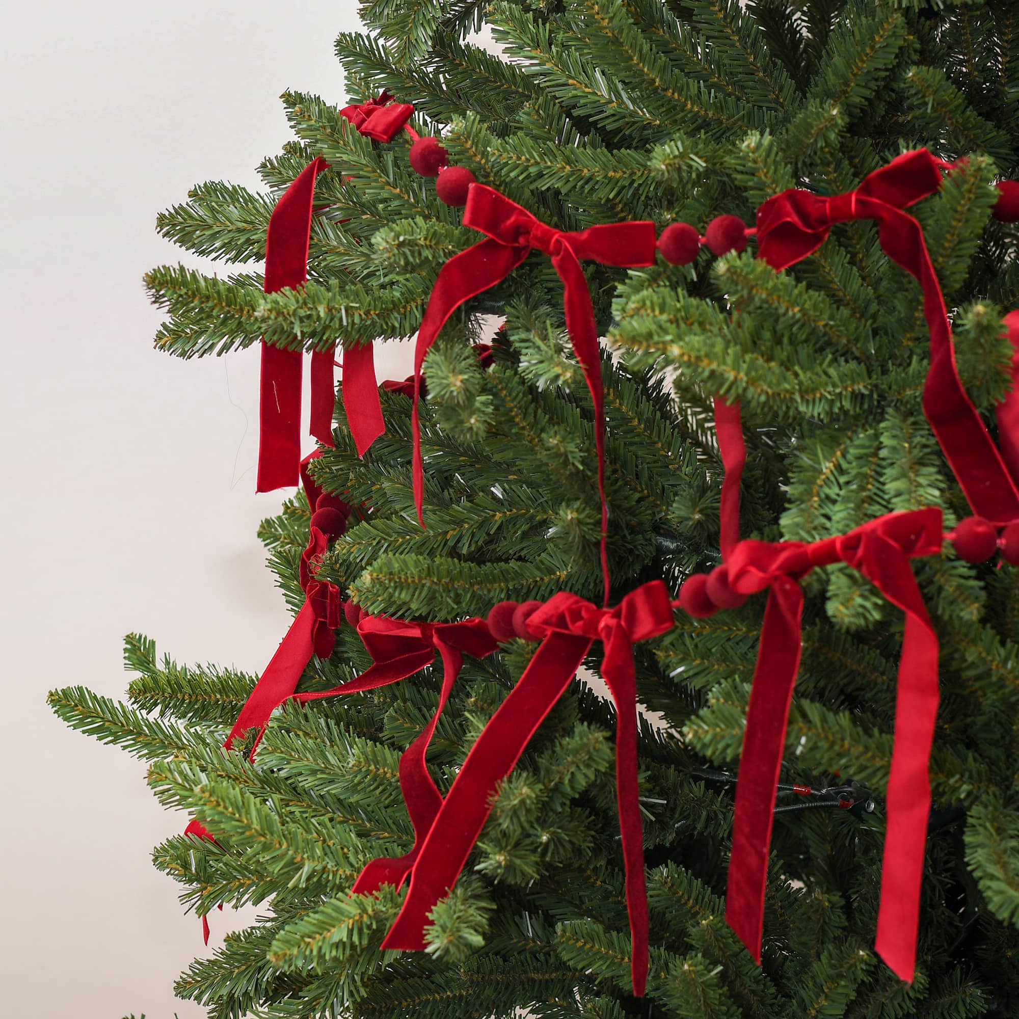 6ft. Dark Red Flocked Bead &#x26; Bow Garland by Ashland&#xAE;