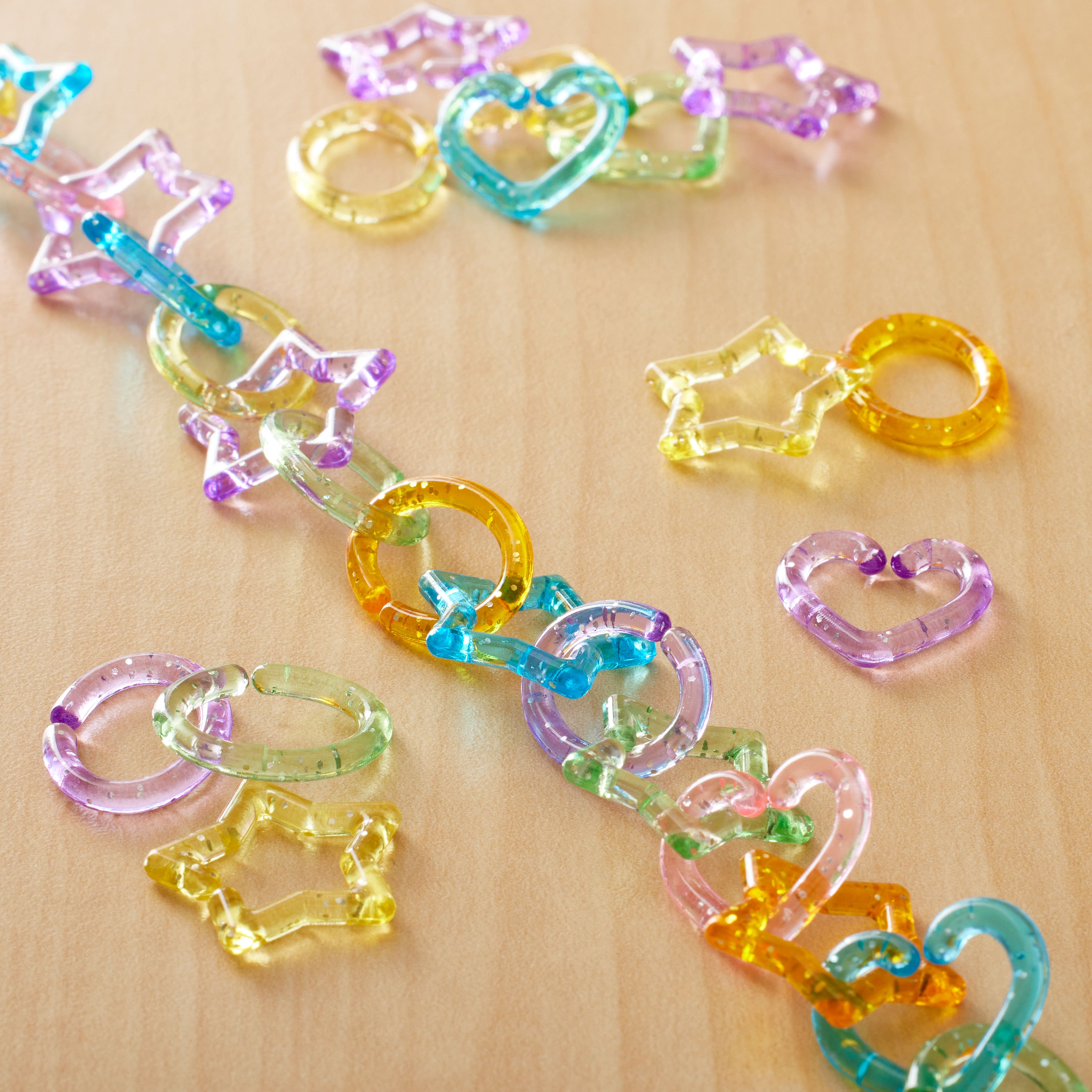 12 Packs: 200 ct. (2,400 total) Glitter Pastel Mixed Shape Chain Links by Creatology&#x2122;