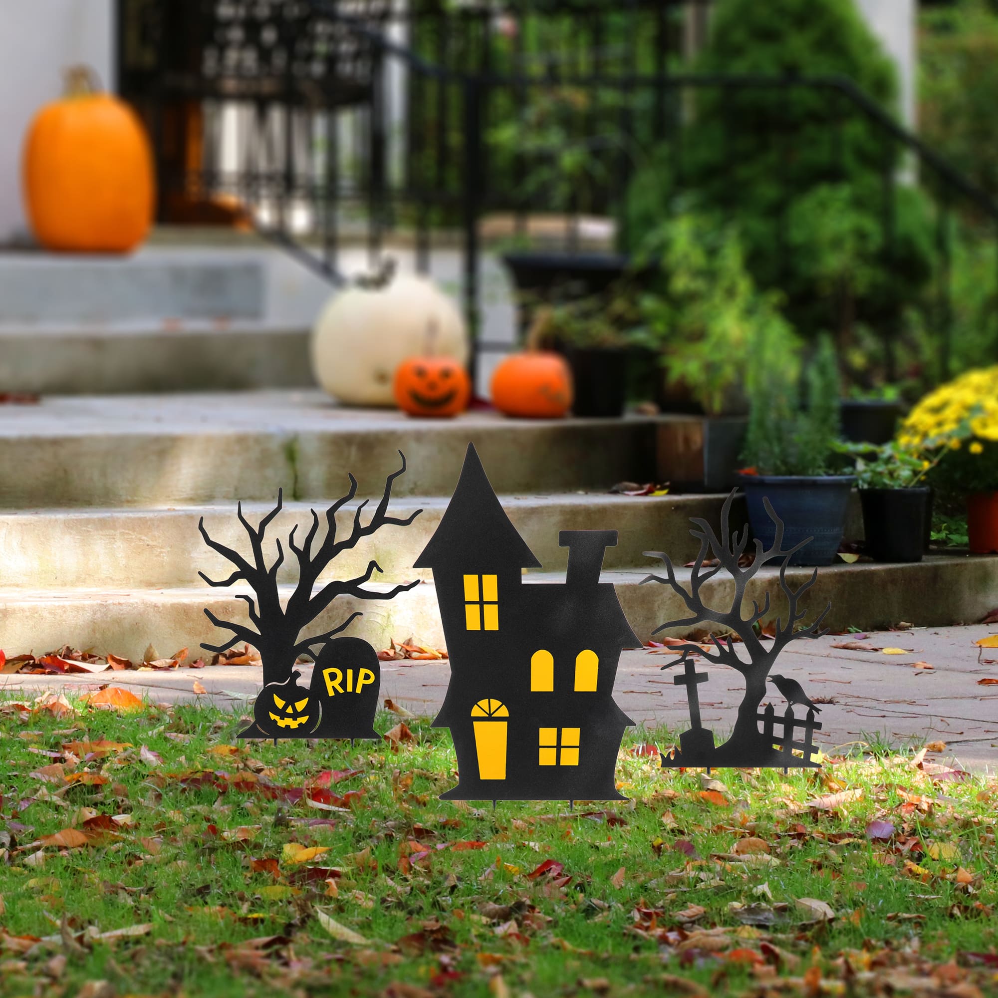 Glitzhome&#xAE; 2ft. Halloween Metal Silhouette Haunted House and Ghost Tree Yard Stake Set