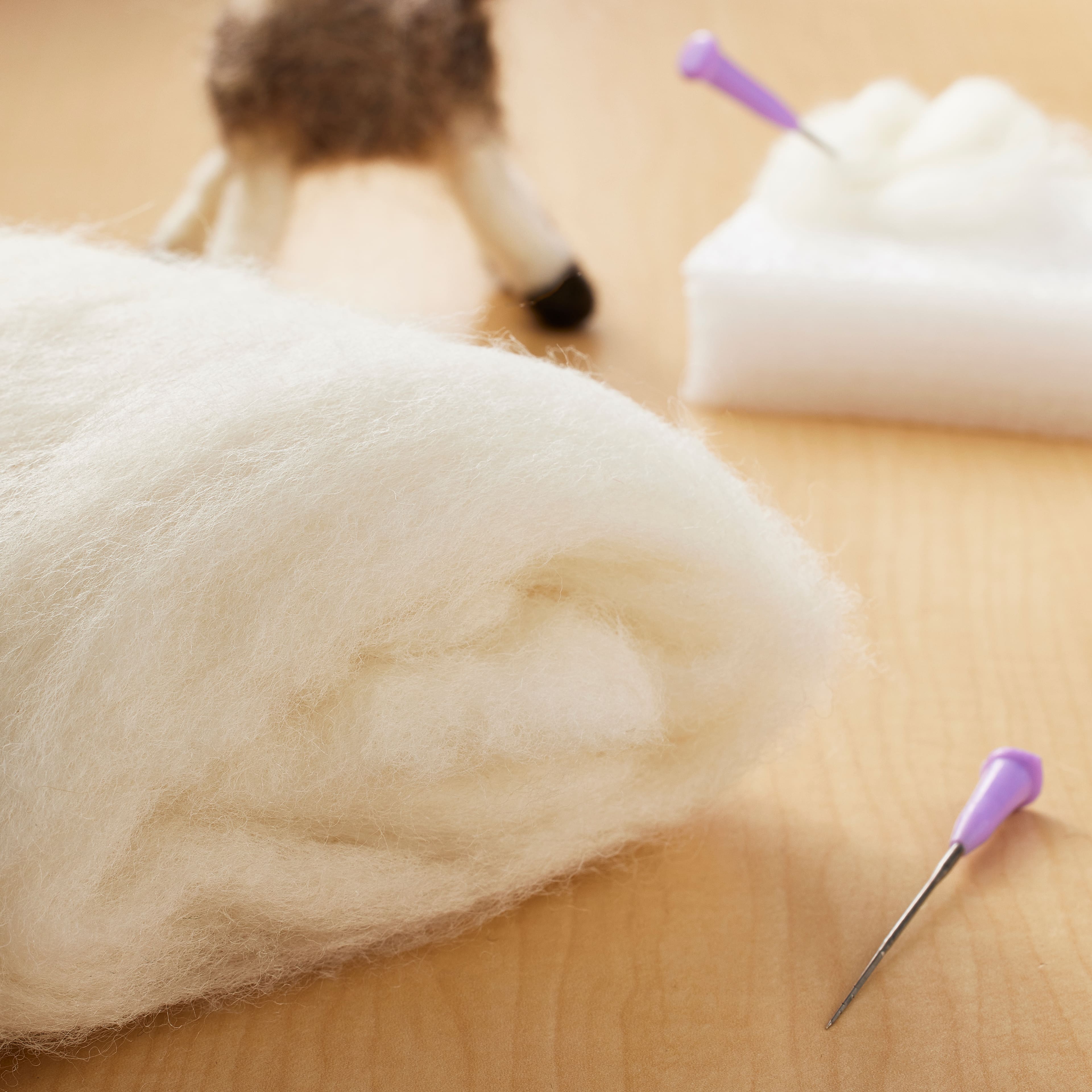 Dimensions® Bulk White Wool Roving