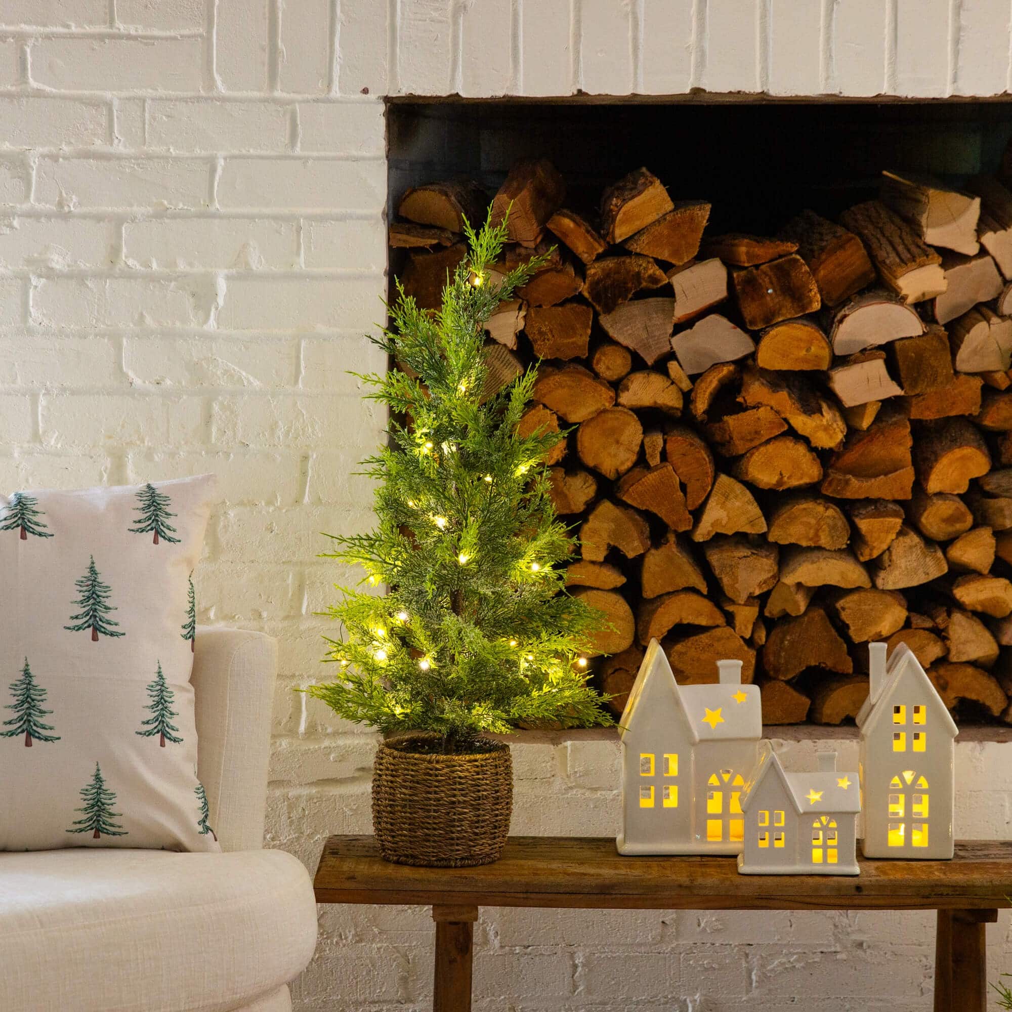 32in. Pre-Lit Artificial Lightly Snowed Cypress Christmas Tree with 30 Warm White LED Lights in Decorative Weaved Basket