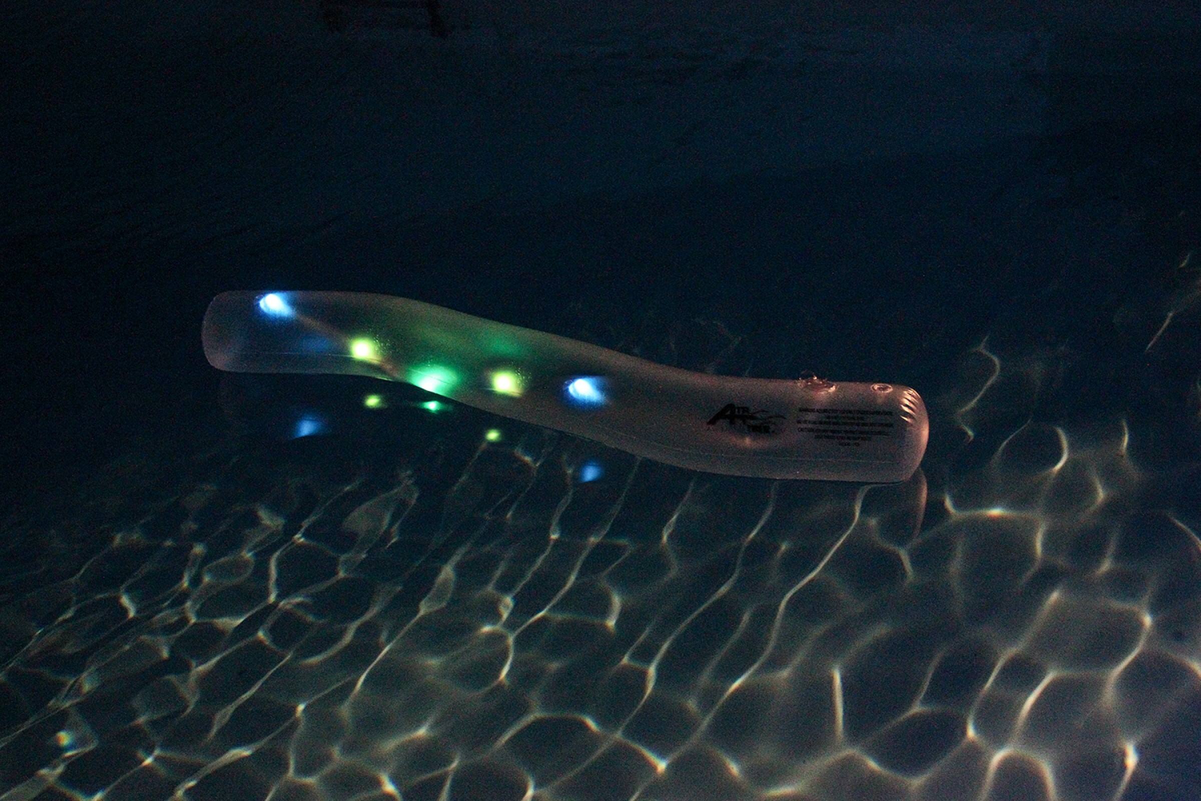 Pool Central® 6ft. White LED Lighted Inflatable Swimming Pool Noodle Toy