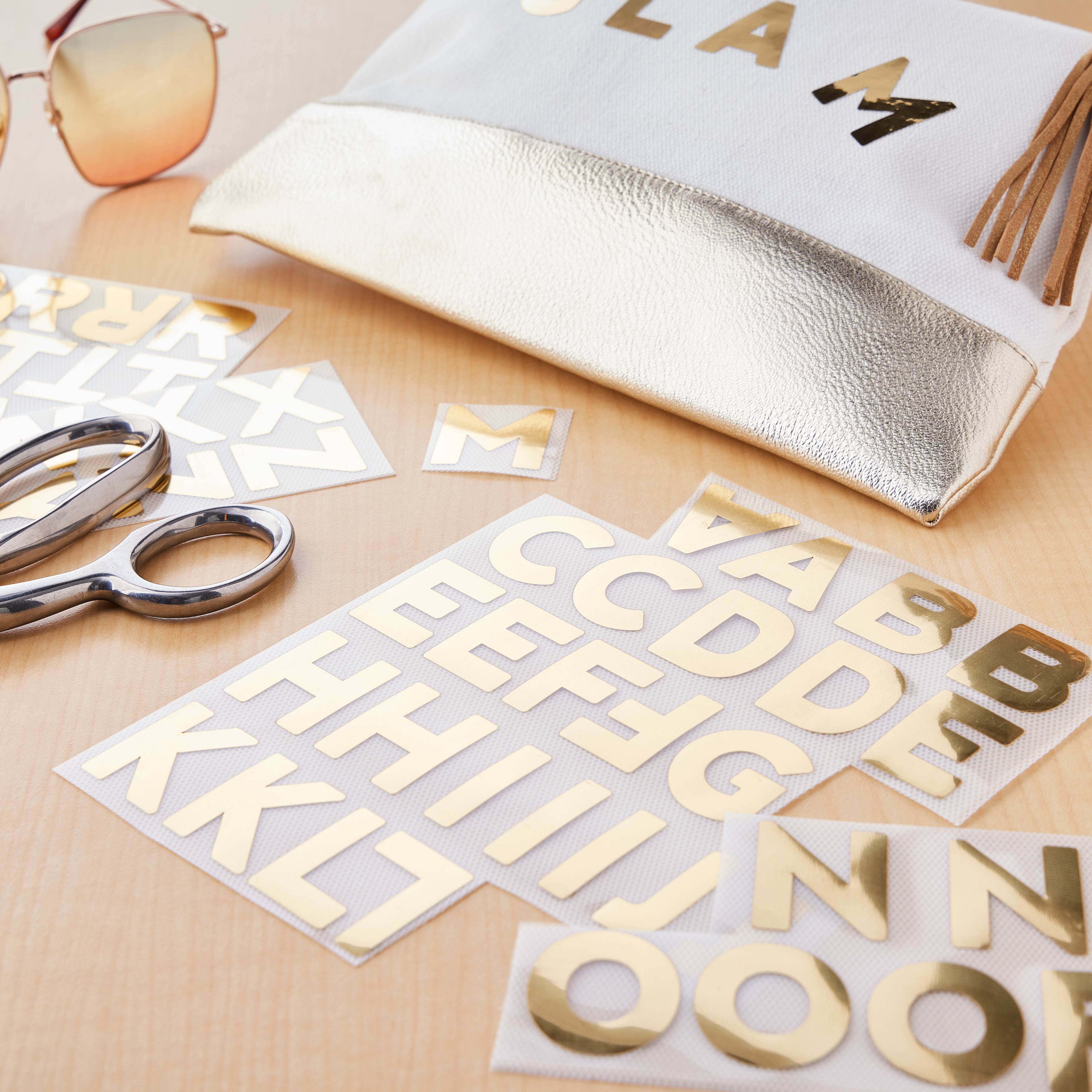 12 Packs: 62 ct. (744 total) Iron-On Gold Foil Block Alphabet by Make Market®