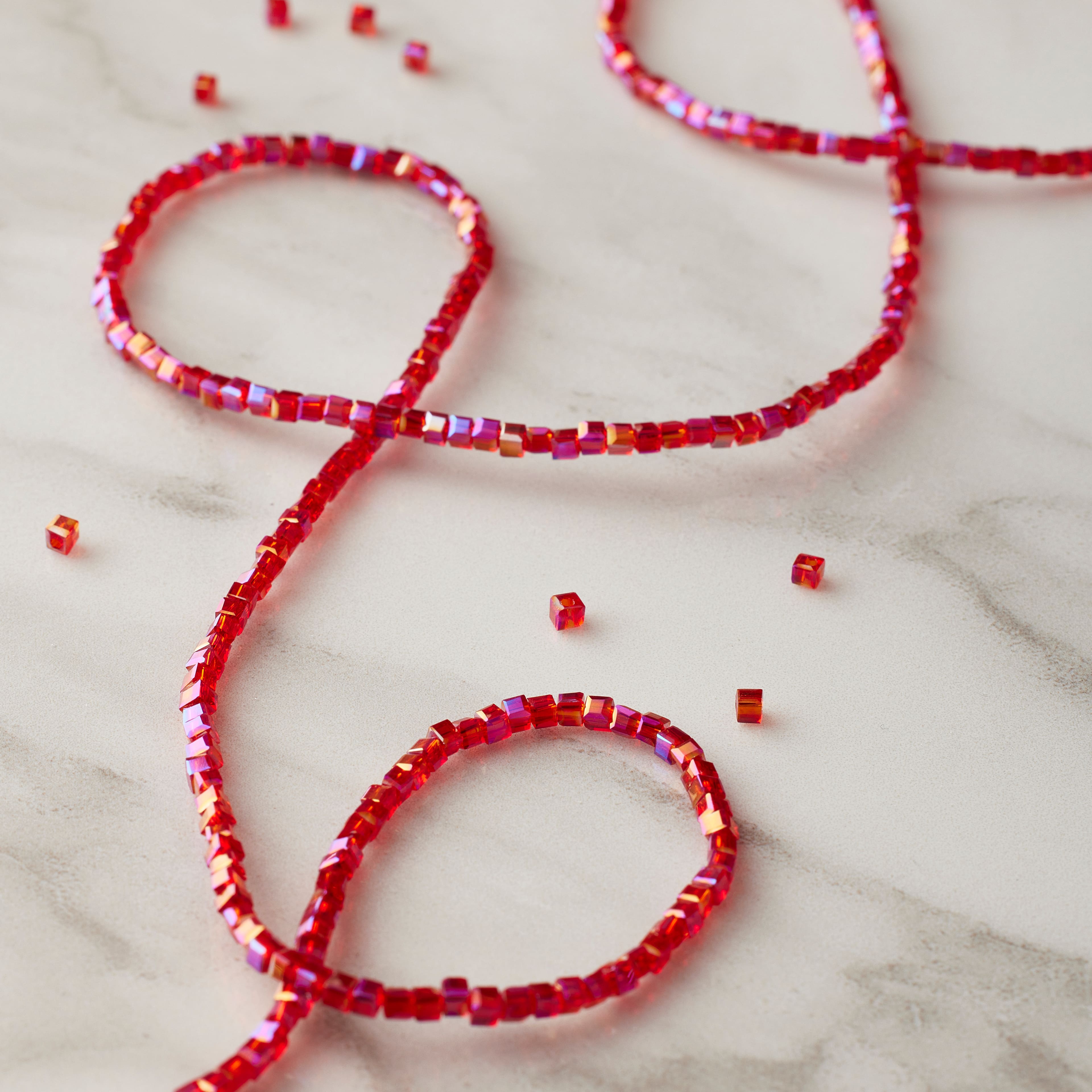 12 Pack: Red Faceted Glass Cube Beads, 2mm by Bead Landing™