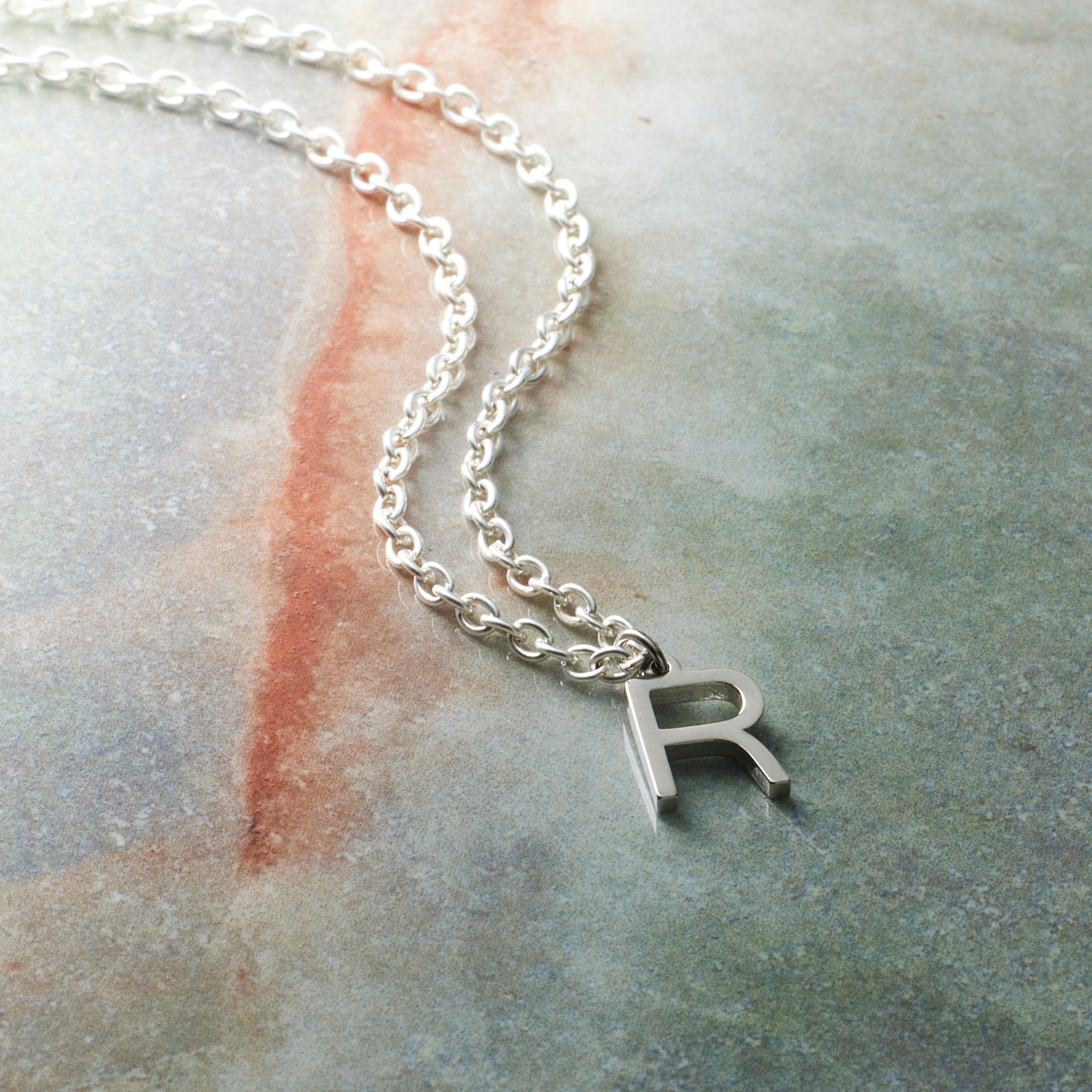 12 Pack: Sterling Silver Alphabet Charm by Bead Landing™