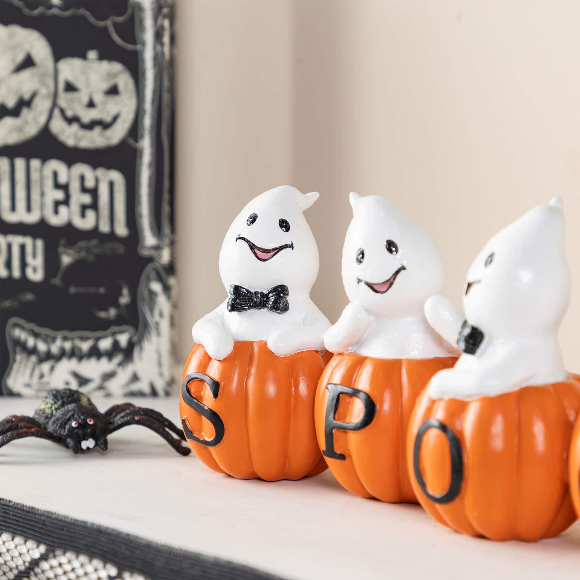 Glitzhome&#xAE; 15.5&#x22;L Halloween Polyresin SPOOKY Ghost Pumpkin Table Decor