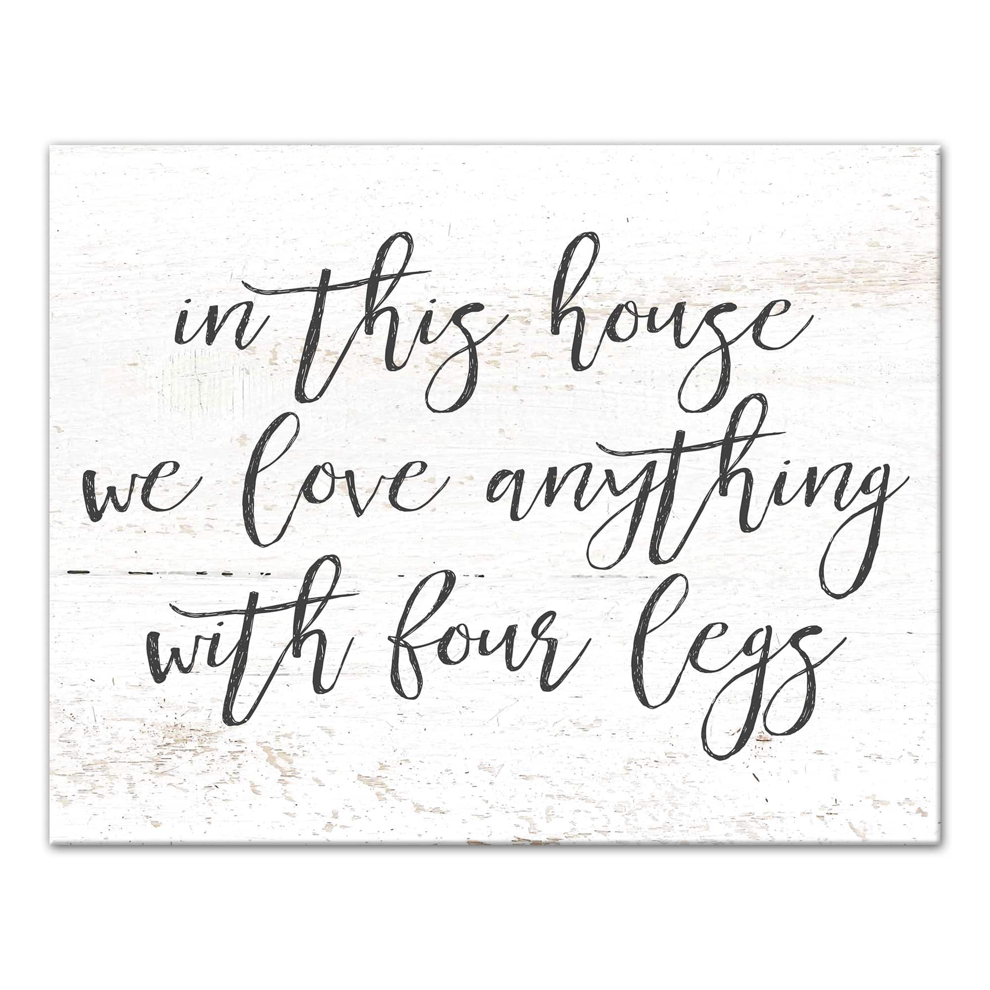 In This House We Love Anything with Four Legs Canvas Wall Art
