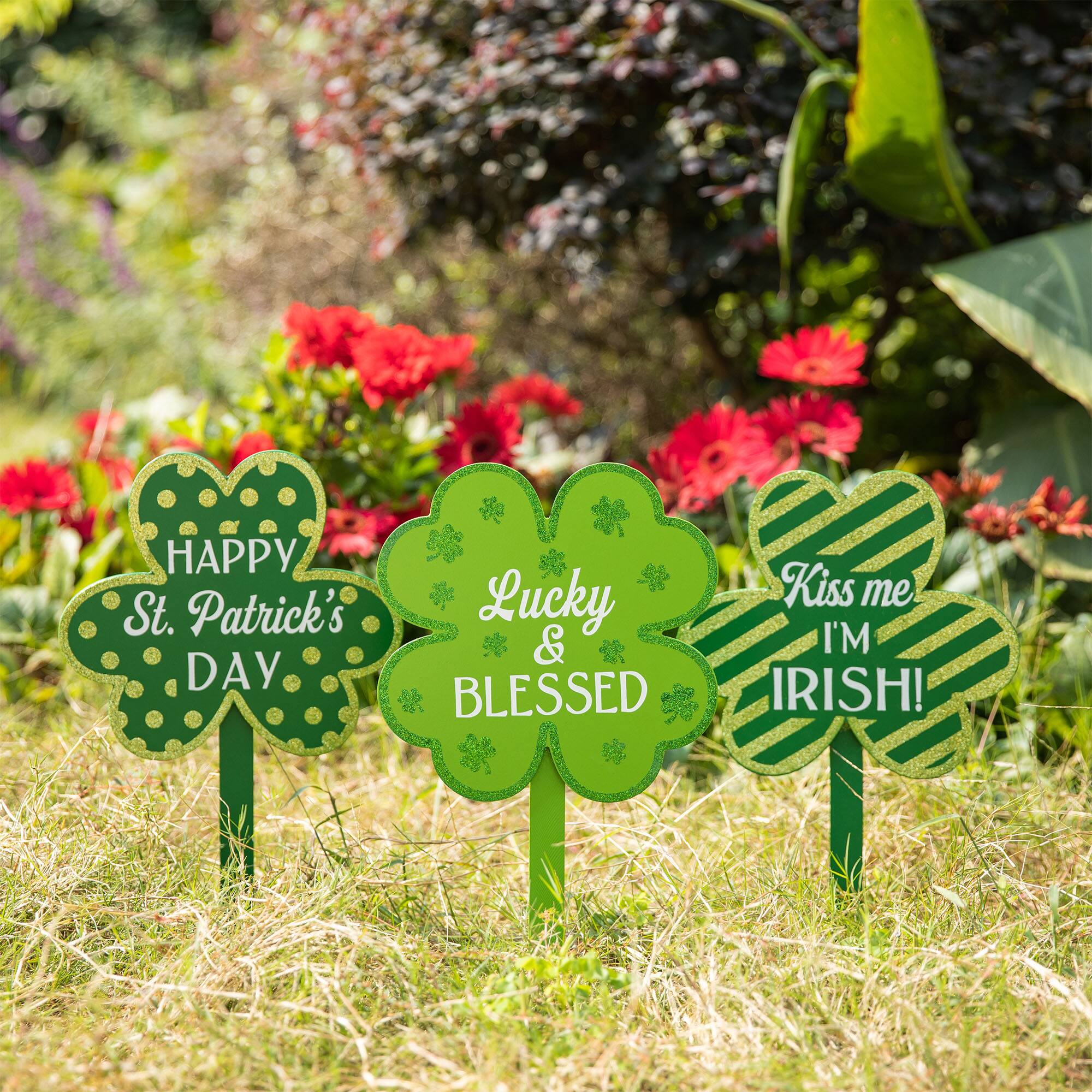 Glitzhome® 15" Wooden St. Patrick's Shamrocks Yard Stake Décor, 3ct.