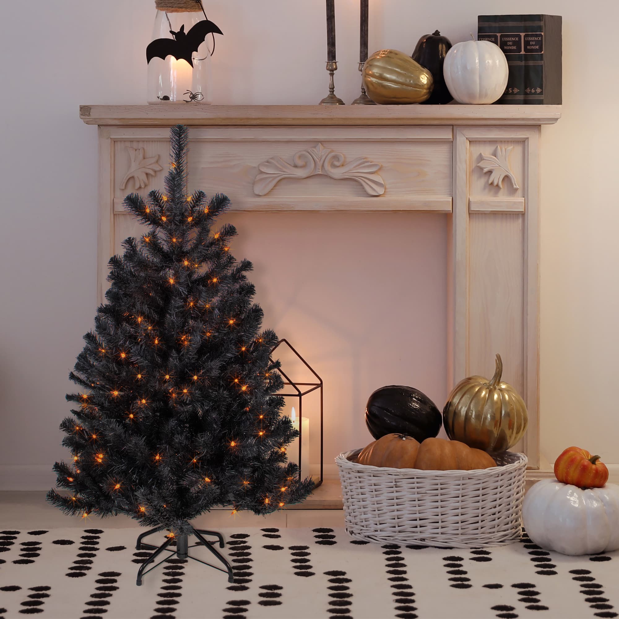 4ft. Pre-Lit Black Noble Spruce Artificial Halloween Tree, Orange Lights