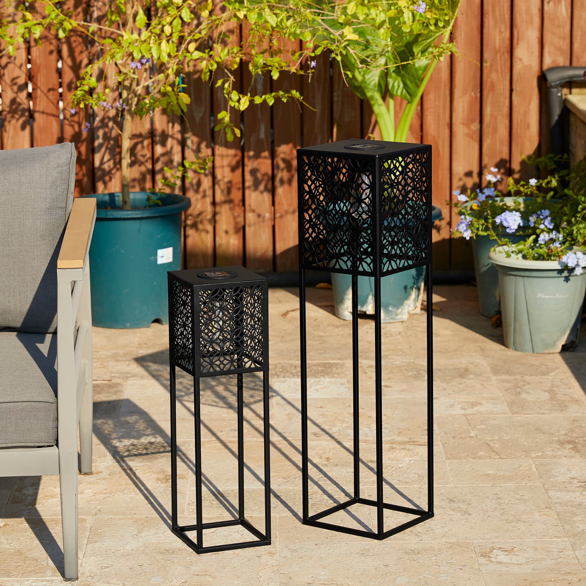 Glitzhome&#xAE; Black Metal Cutout Pattern Solar Powered Outdoor Floor Lanterns Set