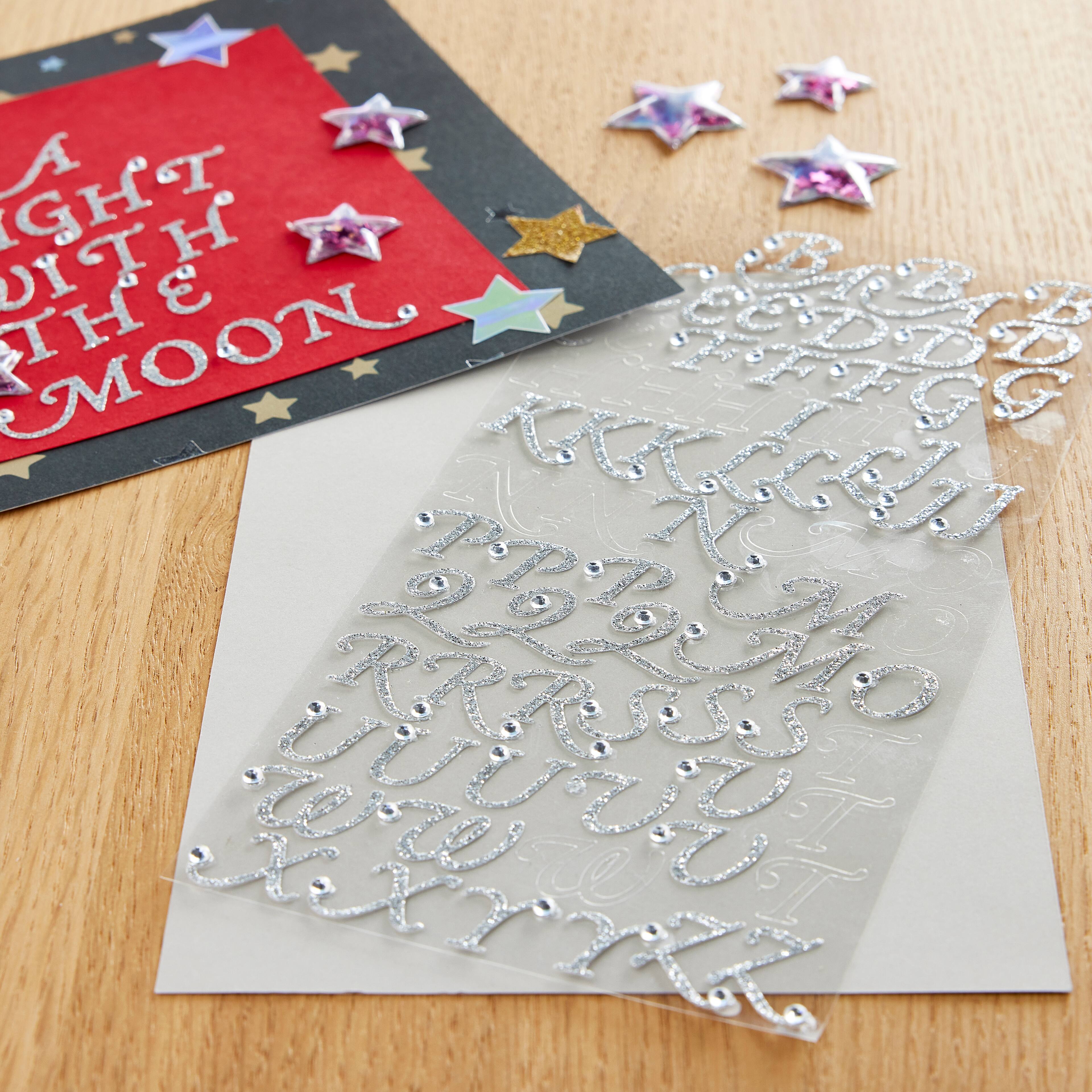 12 Packs: 75 ct. (900 total) Glitter Rhinestone Script Alphabet Stickers by Recollections™
