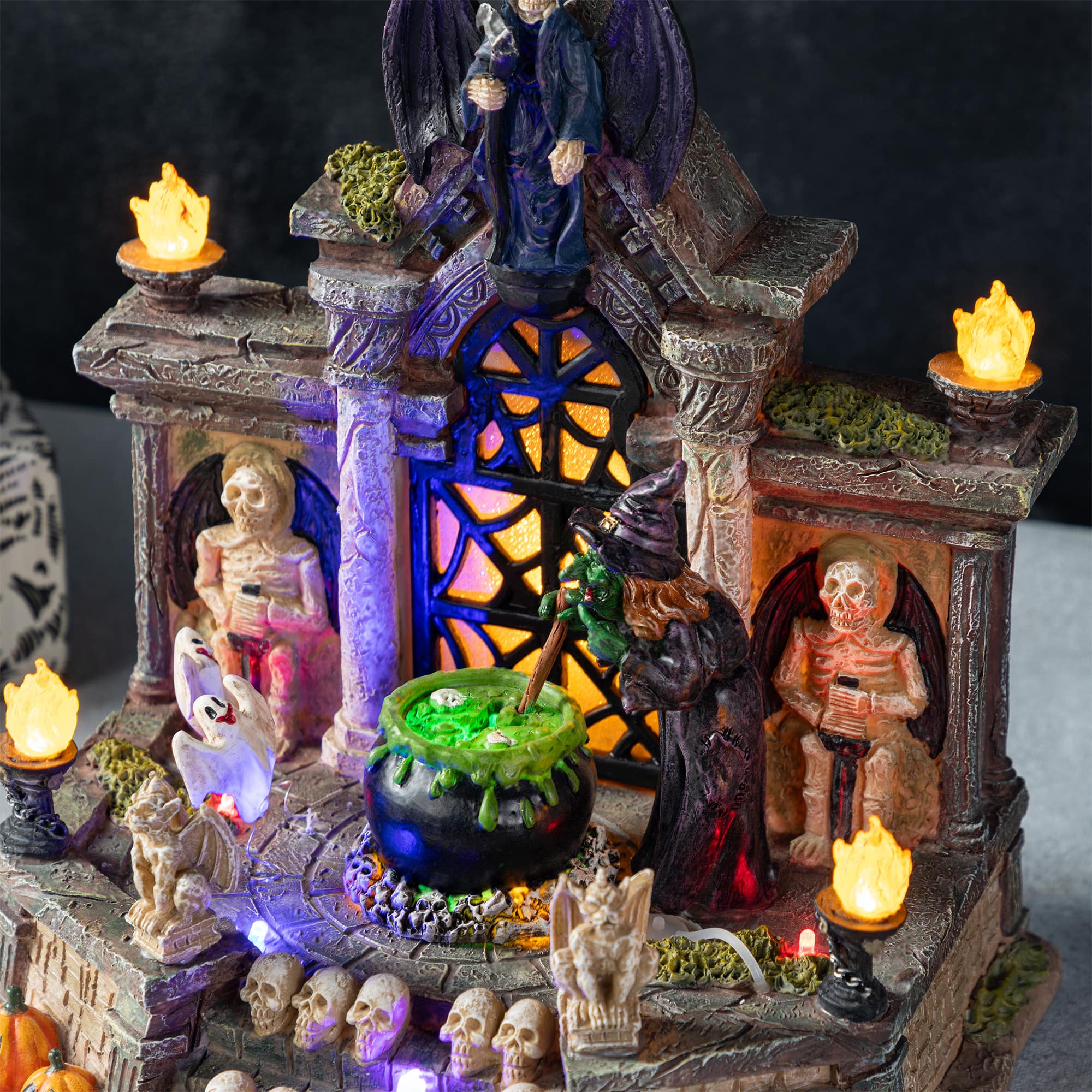 Glitzhome&#xAE; 9.75&#x22;H Lighted Resin Halloween Haunted House Village