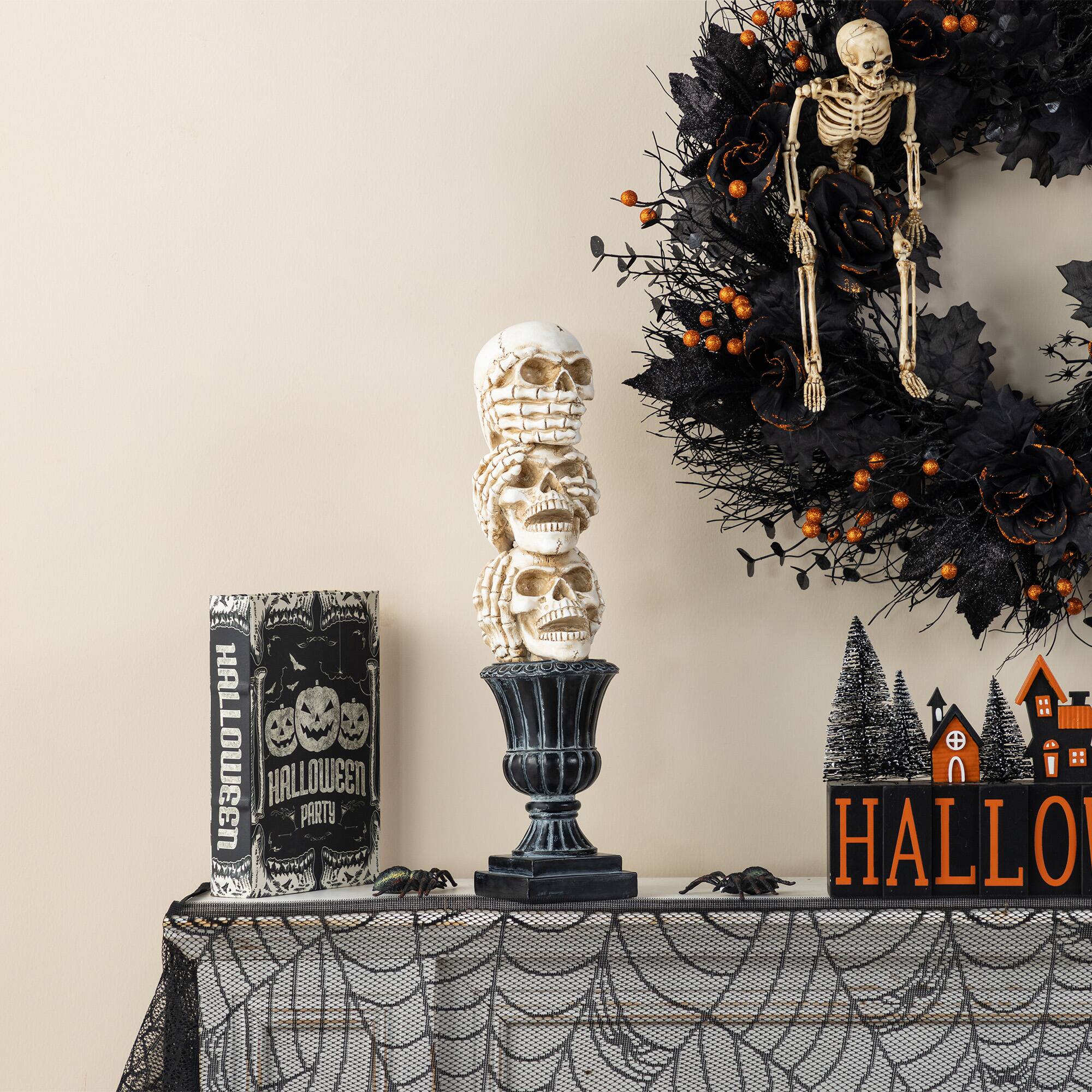 Glitzhome&#xAE; 18&#x22;H Halloween Resin Stacked Skull Table Decor