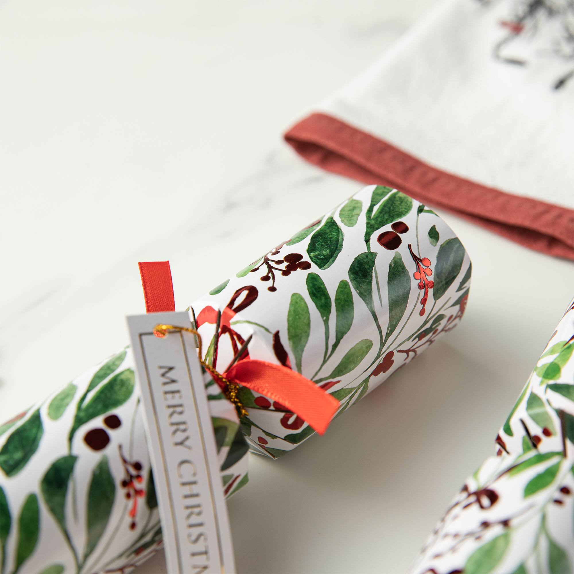 Glitzhome® 10" Christmas Holy Leaves Party Cracker with Gift Contents, 8ct.