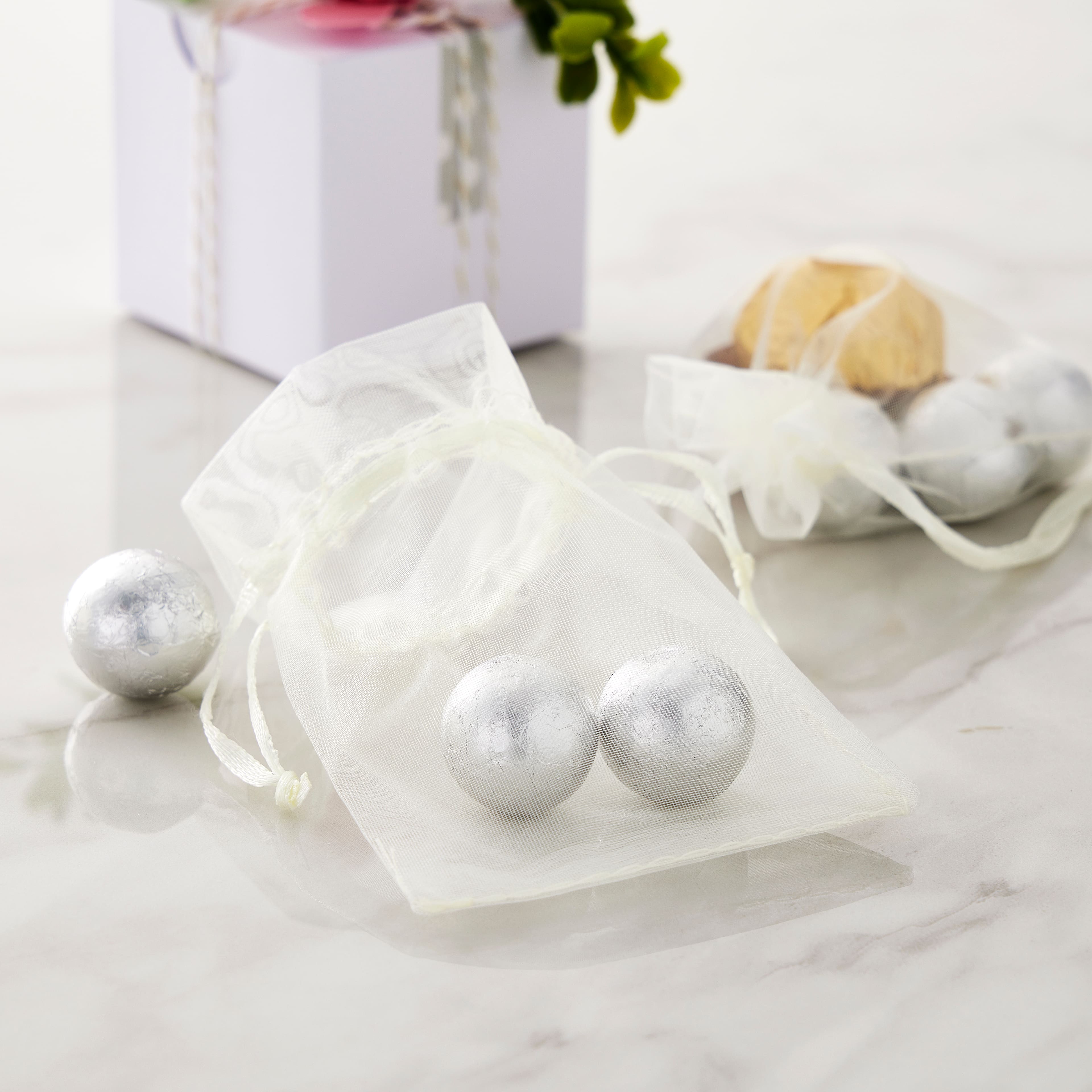 12 Pack: Small Ivory Organza Favor Bags by Celebrate It&#x2122; Occasions&#x2122;