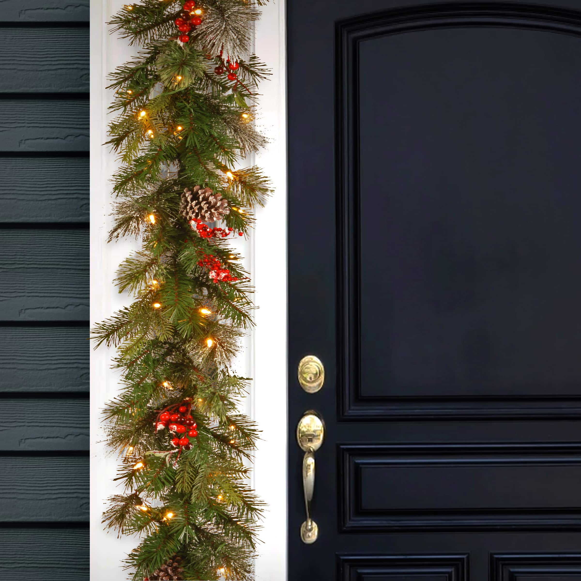 9ft. Pre-lit Feel Real&#xAE; Wintry Berry Collection Artificial Christmas Garlands with Big Pine Cones, Red Berries &#x26; Snowy Bristle with 70 Clear Lights