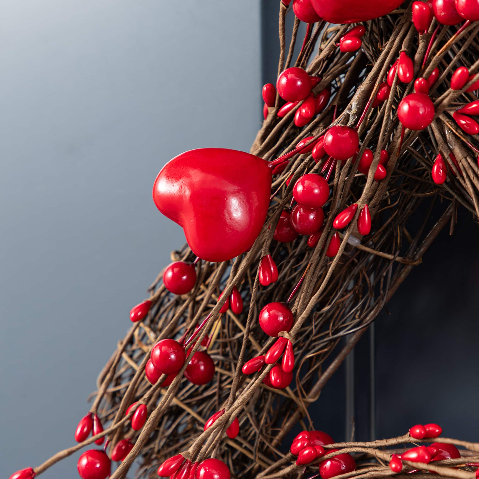 Glitzhome® 24" Red Valentine's XO Shaped Wreath