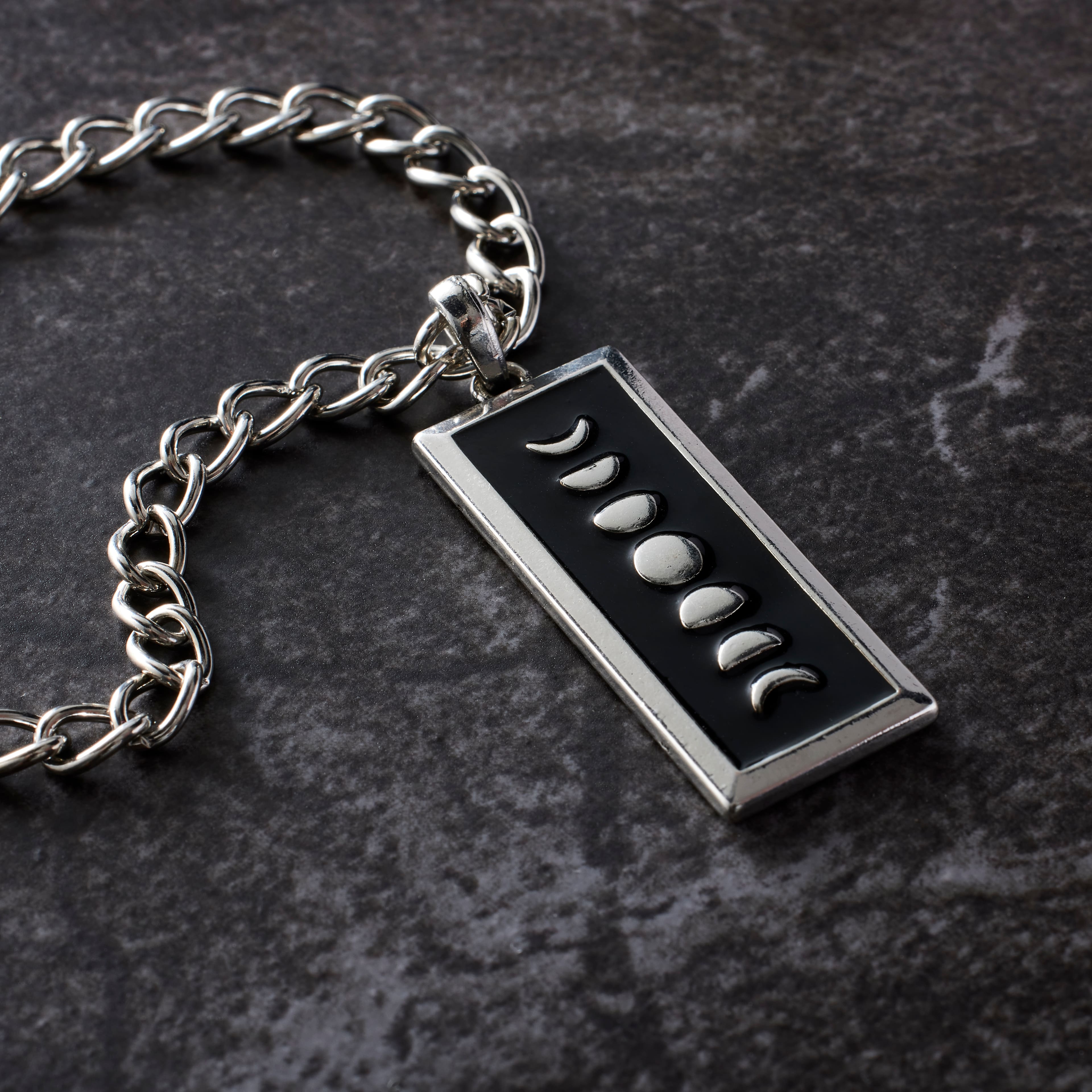 12 Pack: Black & Silver Metal Moon Phases Pendant by Bead Landing™