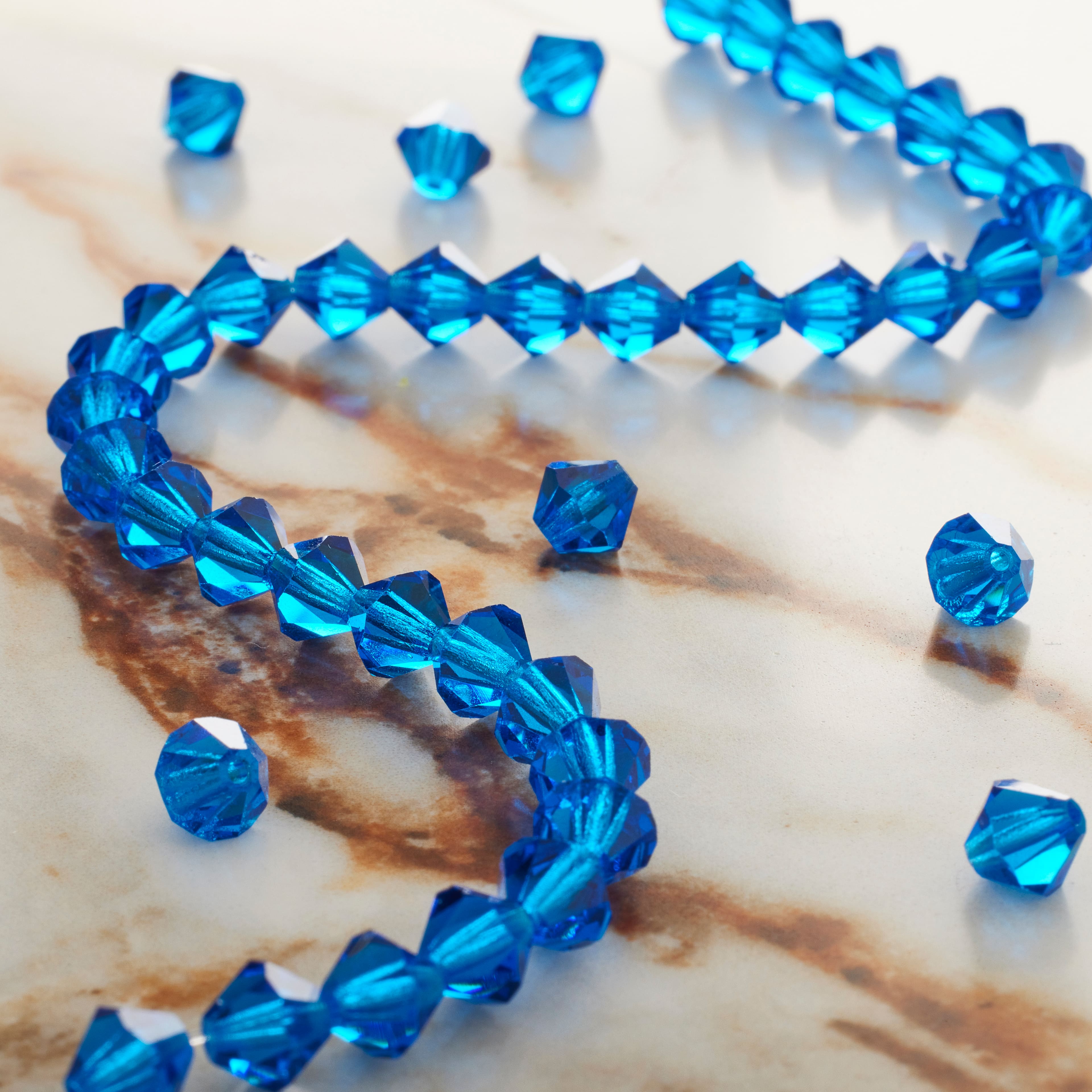 12 Pack: Preciosa Glass Crystal Bicone Beads, 6mm by Bead Landing™