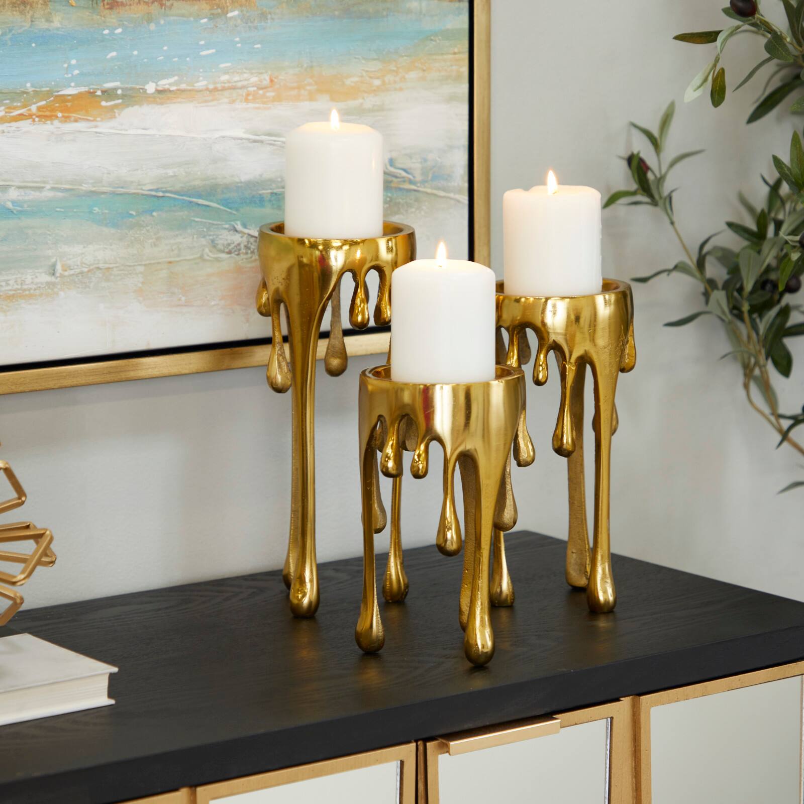 CosmoLiving by Cosmopolitan Gold Aluminum Pillar Candle Holder with Dripping Melting Designed Legs Set
