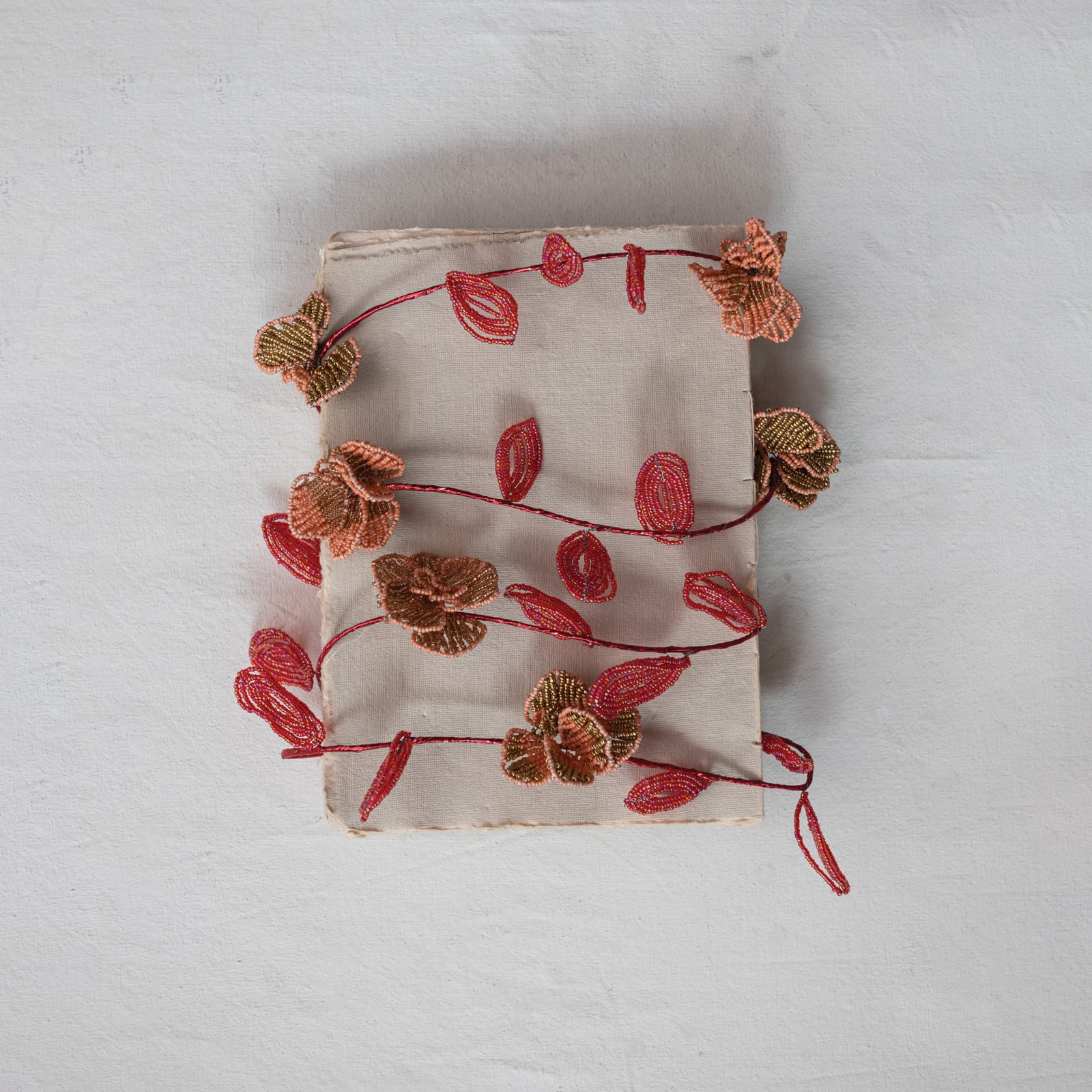 Hello Honey® 6ft. Pink Glass Bead Wired Leaves & Flowers Garland