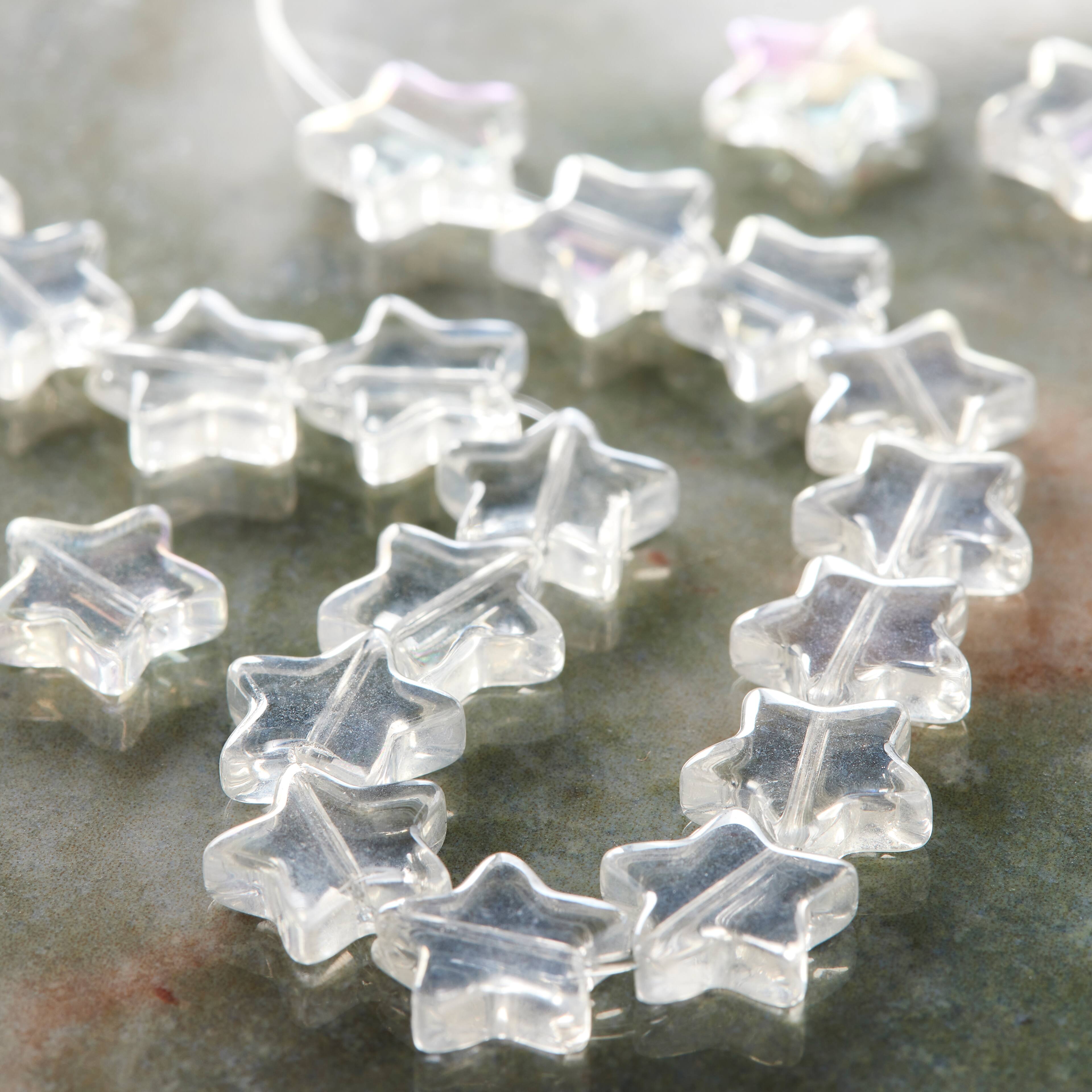 12 Packs: 21 ct. (252 total) Clear Glass Star Beads, 12mm by Bead Landing™