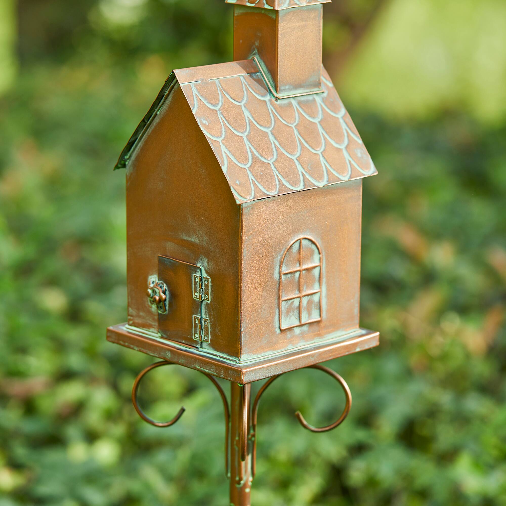 Glitzhome&#xAE; 4ft. Faux Copper Distressed Metal Church Birdhouse with Stake