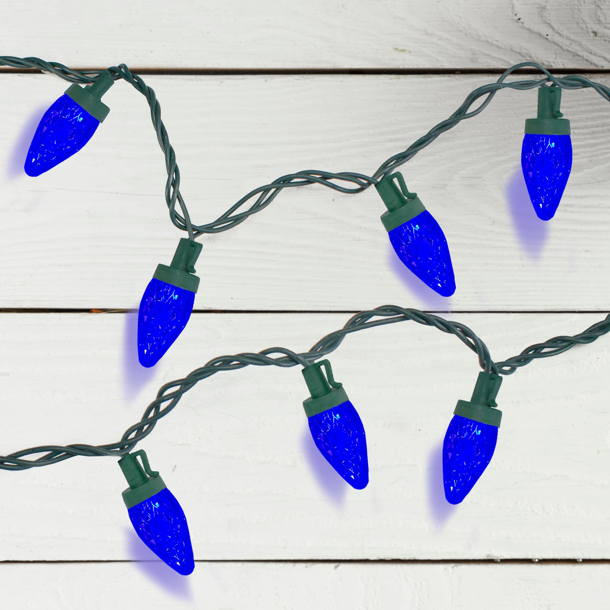 50ct. Faceted Blue LED C7 Christmas String Lights with Green Wire