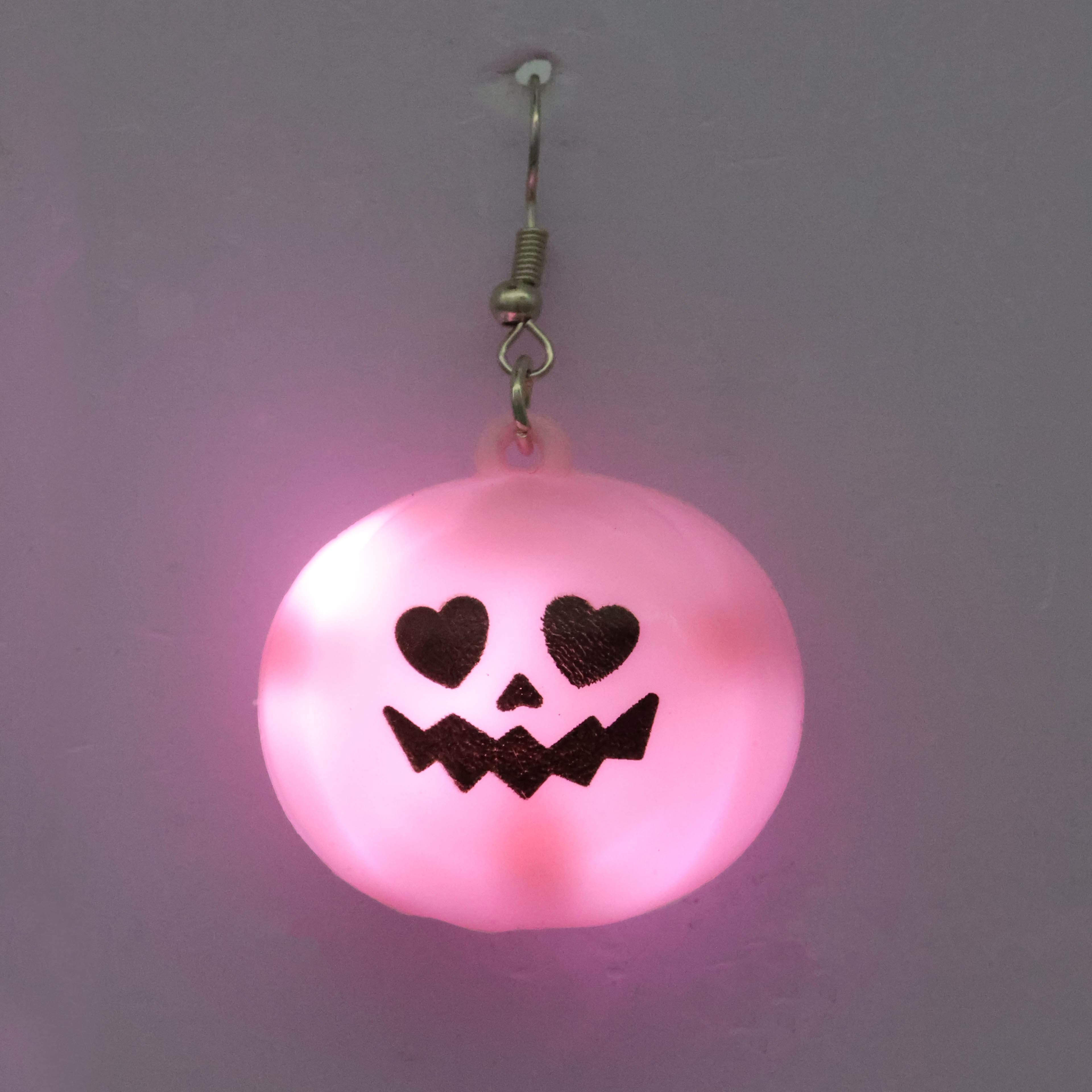 Pink Light Up Heart-Eye Jack-o&#x27;-Lantern Dangle Earrings by Celebrate It&#x2122;