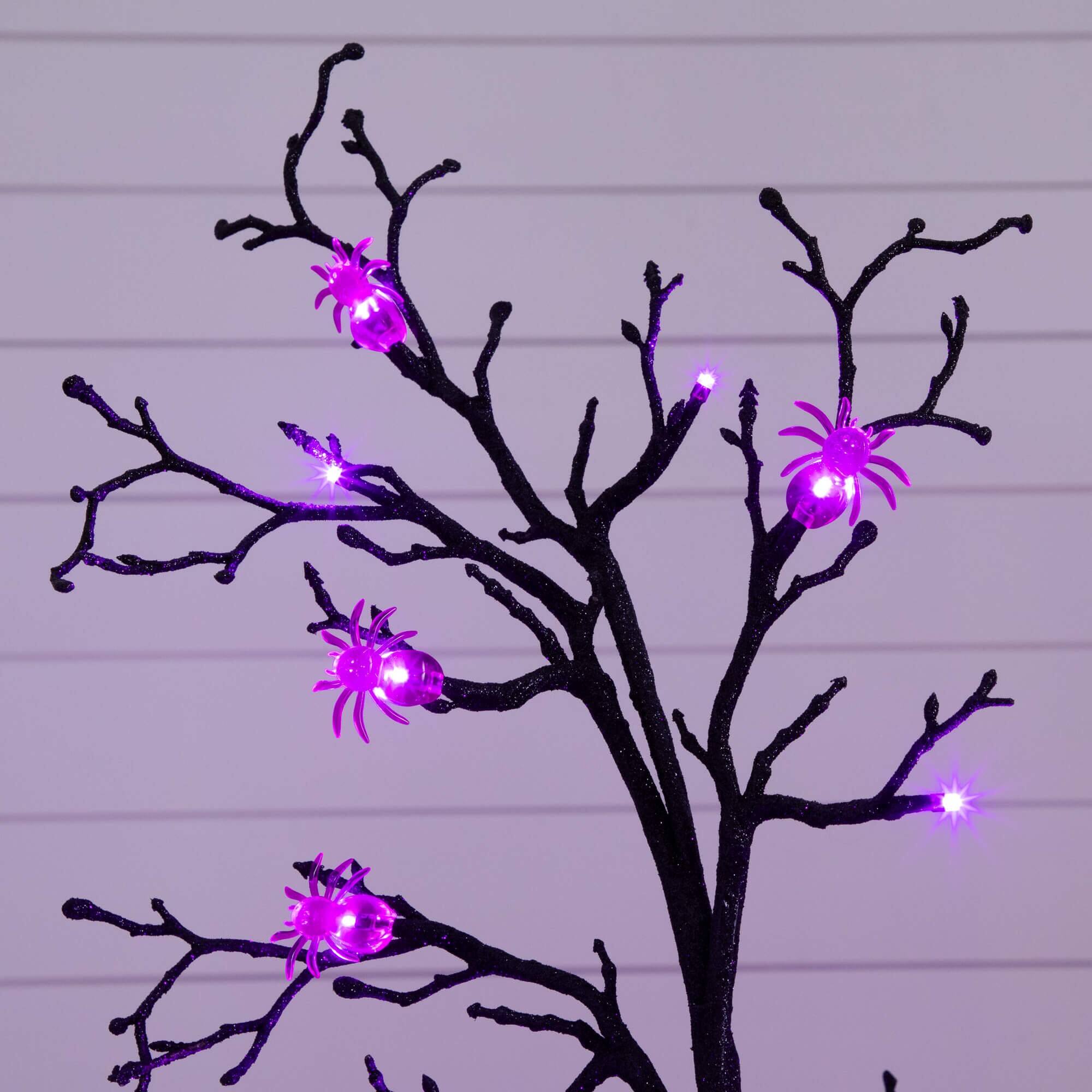 4ft. Pre-Lit Artificial Halloween Spider Twig Tree with 48 Purple LED Lights