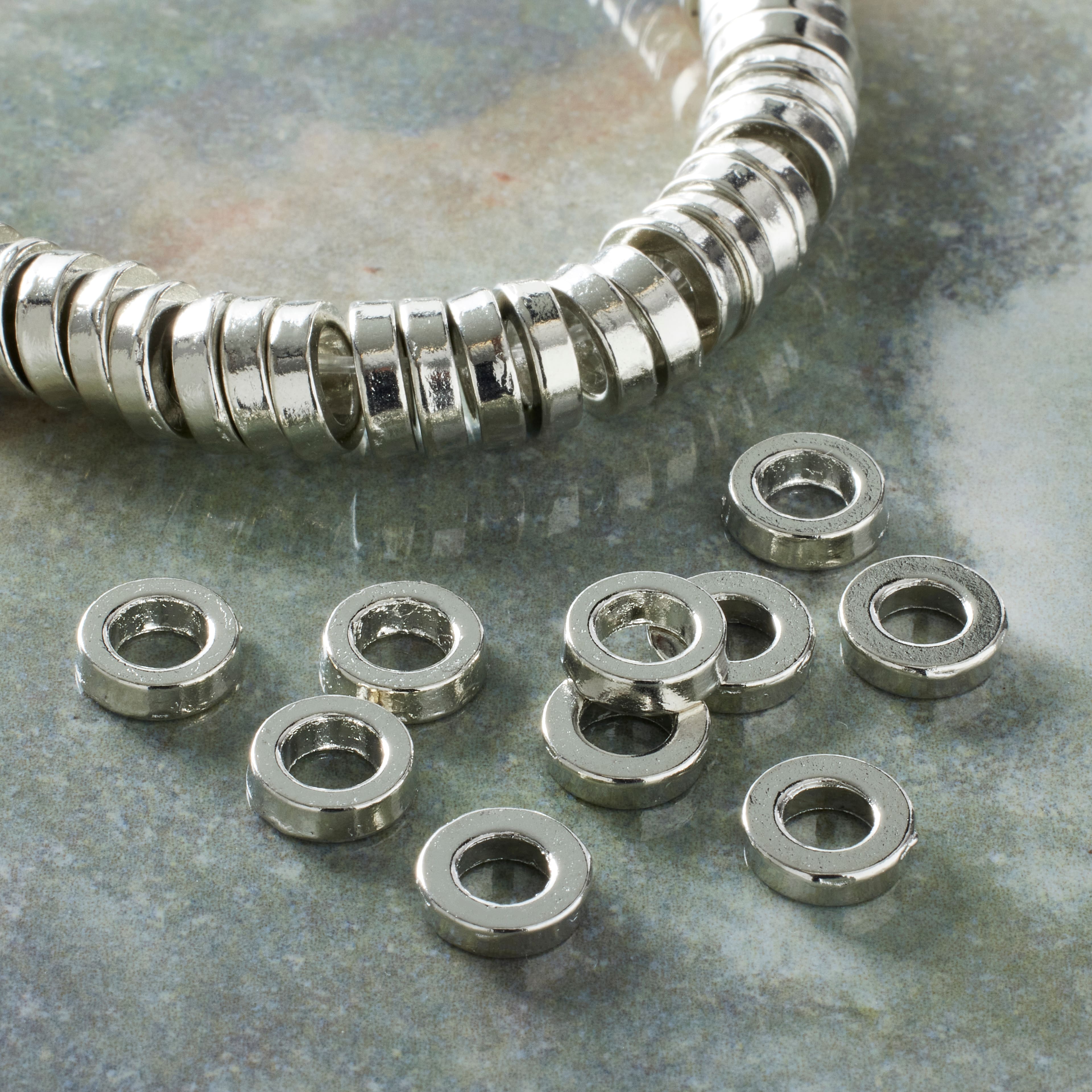 12 Pack: Rhodium Large Hole Metal Disc Spacer Beads by Bead Landing&#x2122;